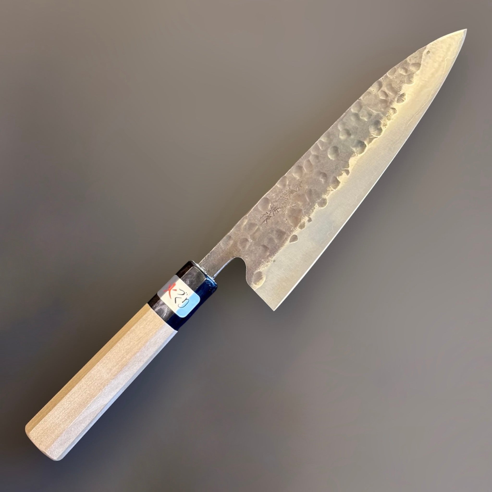 Teruyasu Fujiwara Denka Gyuto 180 mm with wa handle, right side profile on neutral gray background.