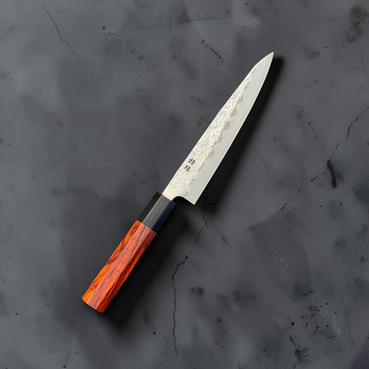 Tokushu Ginsan Nashiji 150mm petty knife with rosewood and ebony handle, full angled view