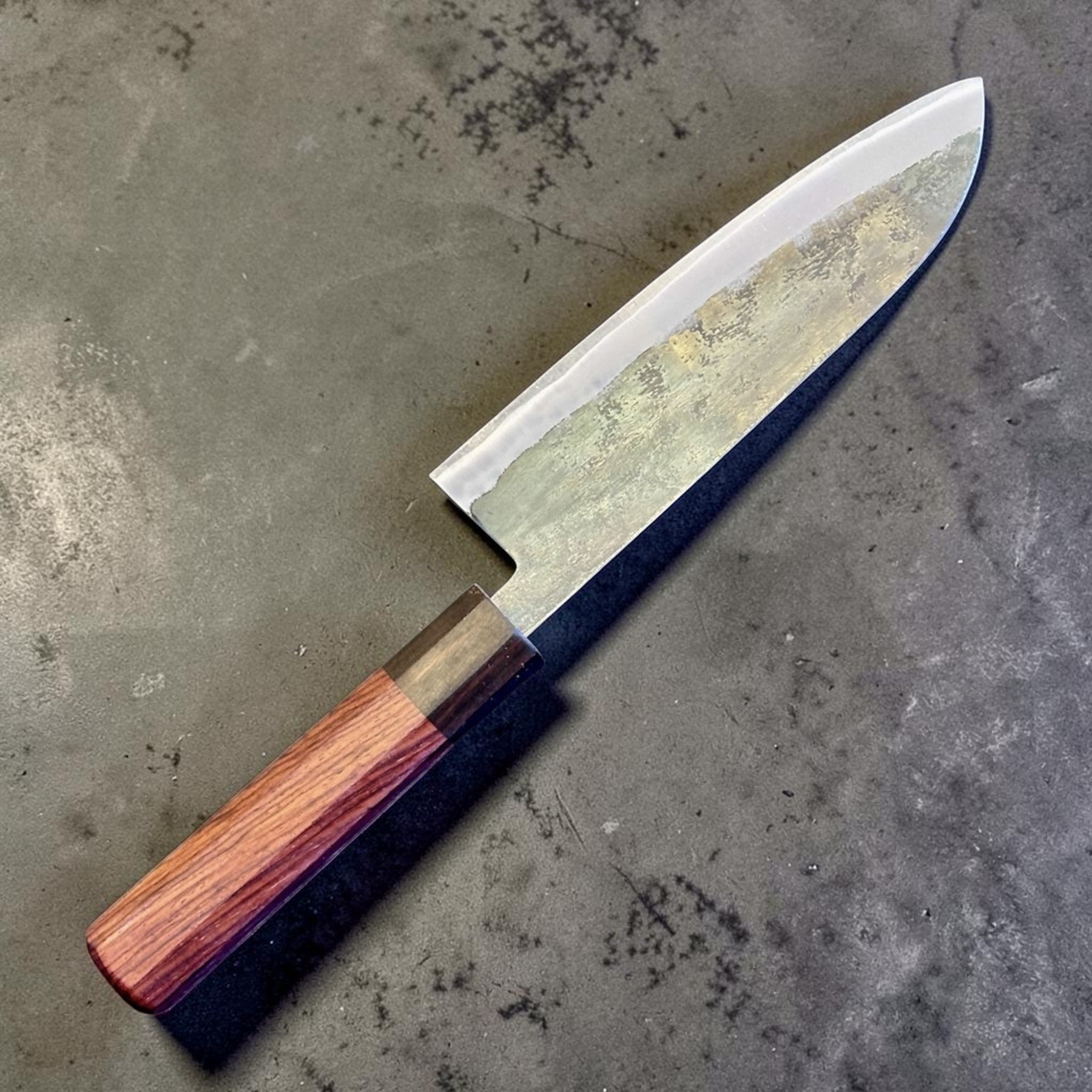 Tokushu Knife Rosewood Series White #2 Kurouchi 165 mm Japanese santoku knife, angled front view showing kurouchi finish and rosewood wa handle.