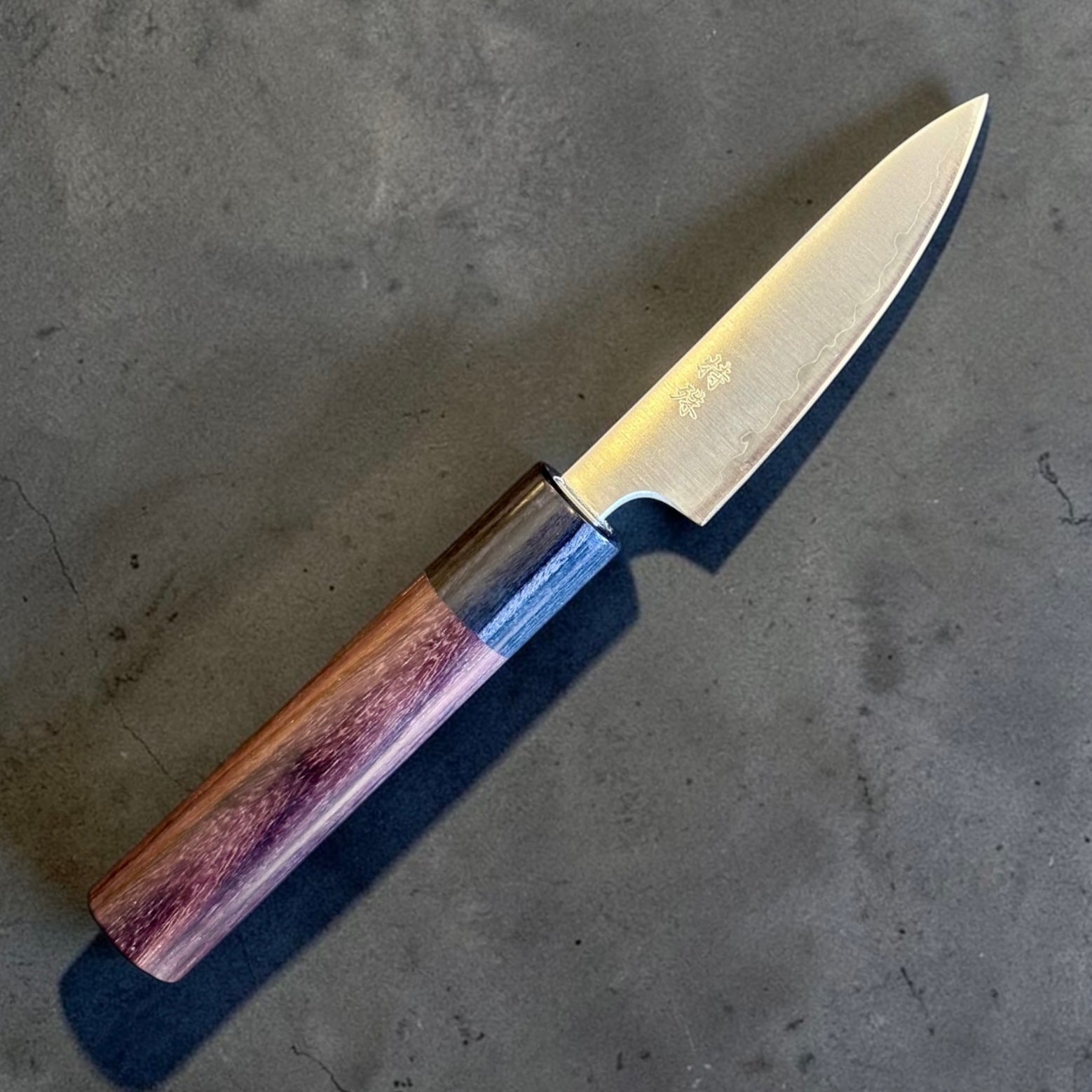 Tokushu Knife Stainless Clad Aogami Super Migaki Petty 80mm, angled blade and handle view showing migaki finish.