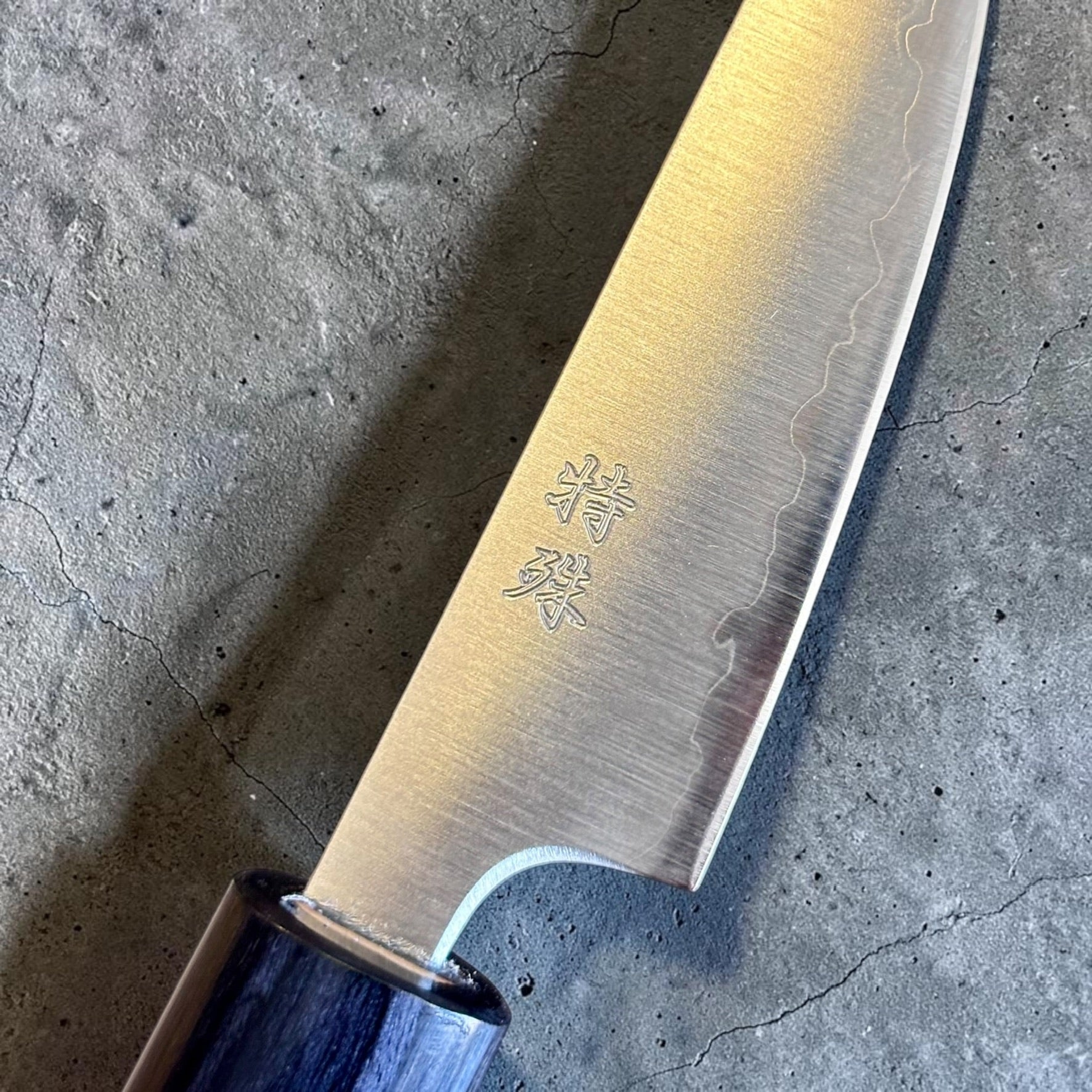 Tokushu Knife Stainless Clad Aogami Super Migaki Petty 80mm, close-up of blade face, kanji engraving, and stainless cladding line.