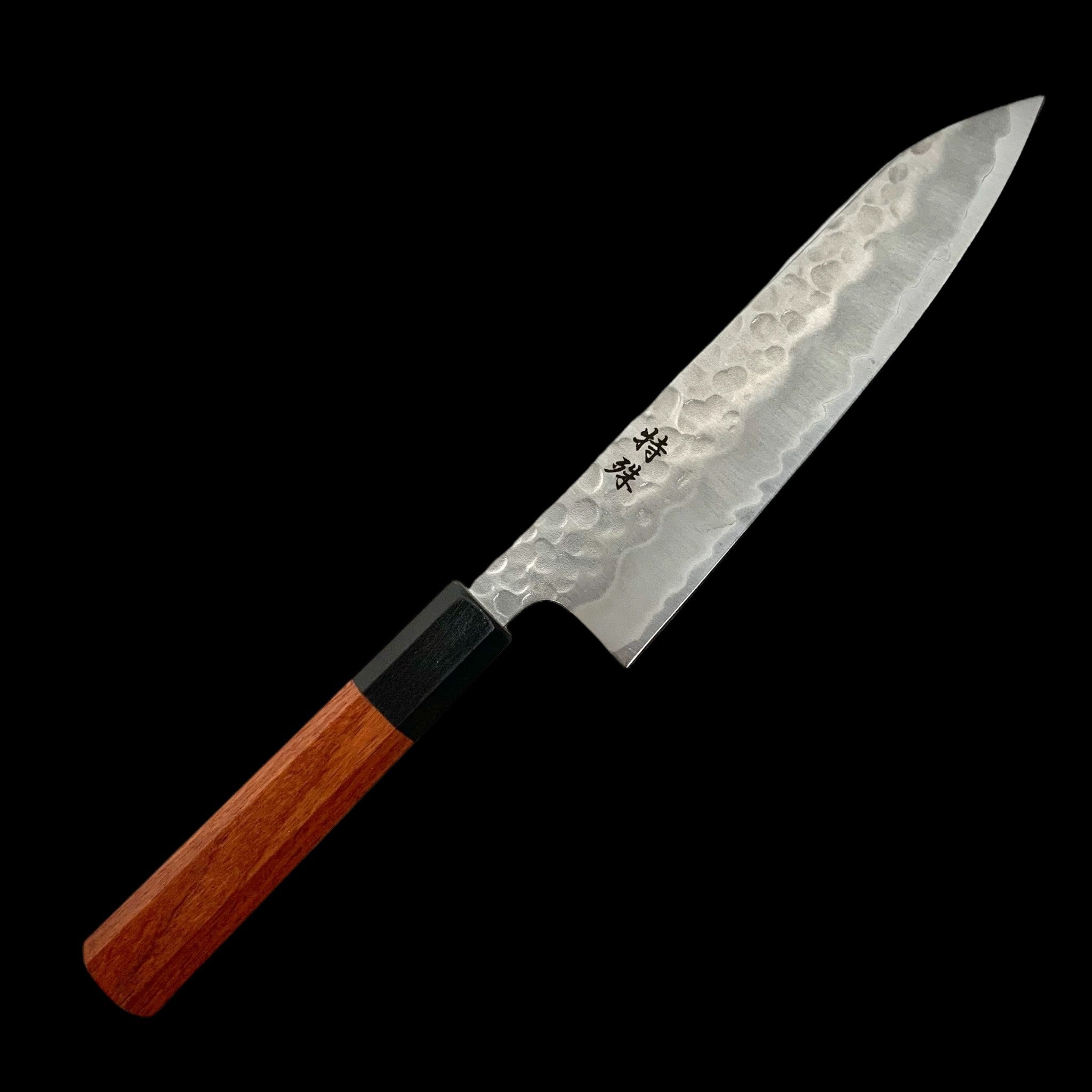 Tokushu Knife White #2 Stainless Clad Tsuchime Gyuto 180 mm — front angle showing hammer‑textured blade and octagonal rosewood handle.