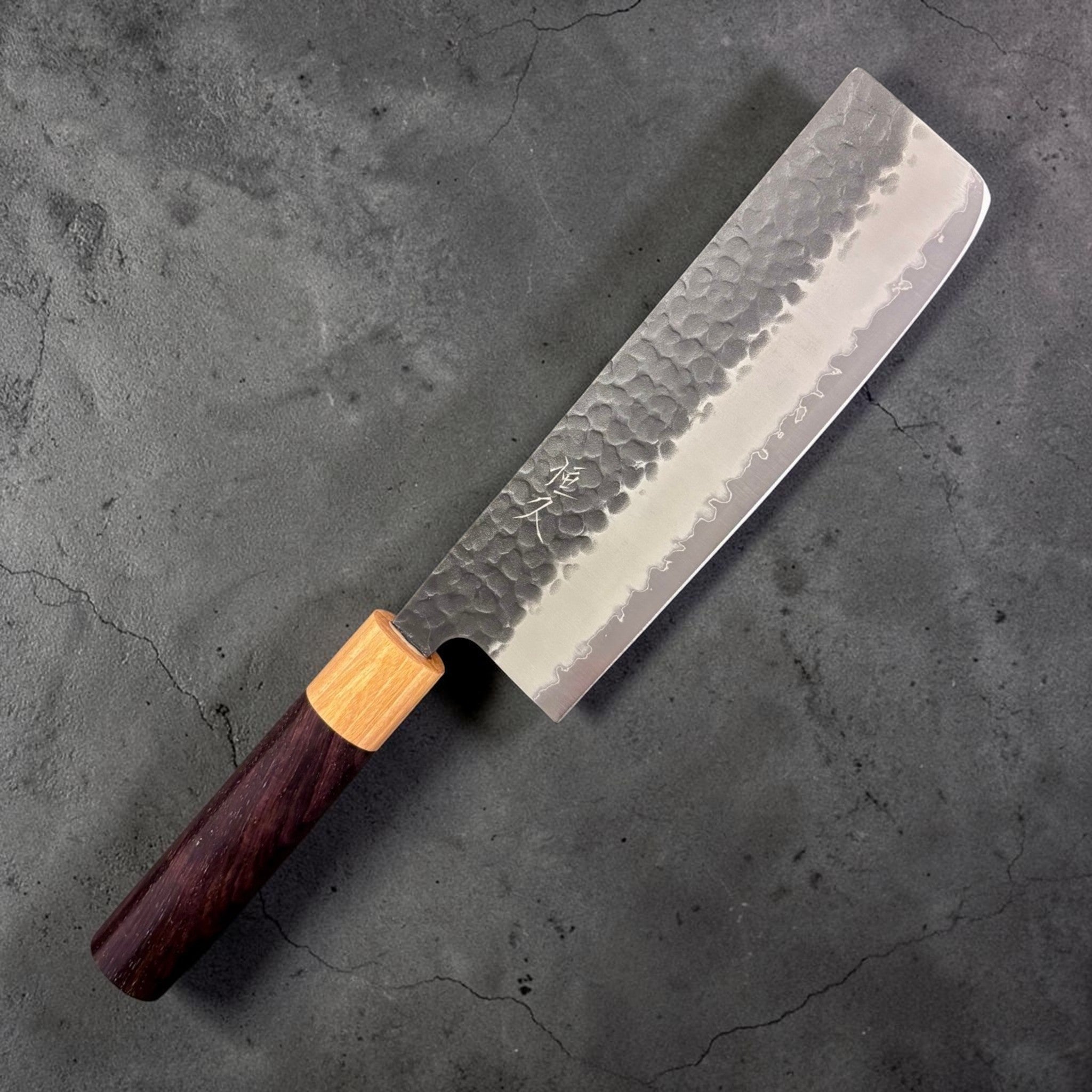 Tsunehisa Aogami Super Kurouchi Tsuchime Nakiri 165 mm, right-side face with hammered kurouchi finish and kanji near the heel, octagonal wa handle.