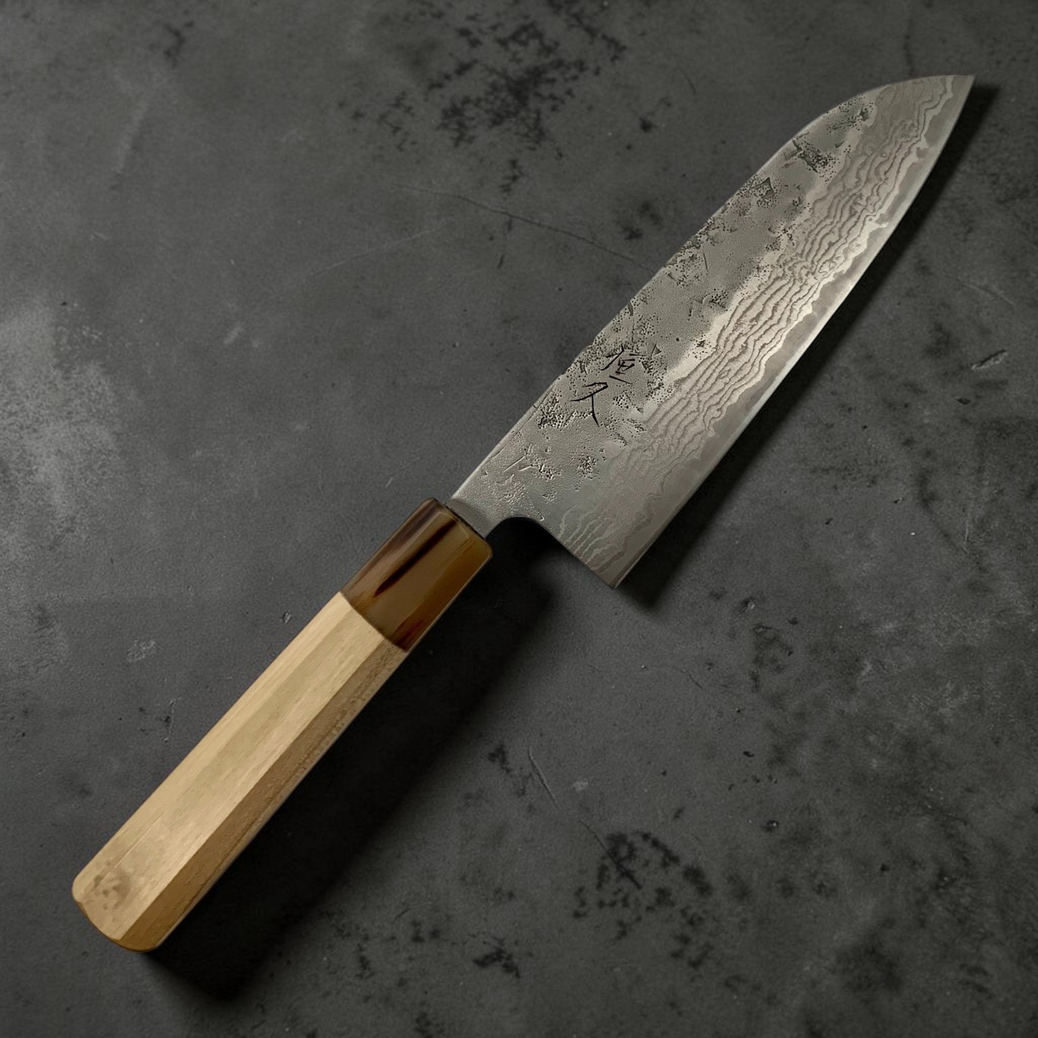 Tsunehisa Swedish Steel Washiji Damascus Santoku 170 mm, right-handed view showing Damascus pattern and octagonal handle.