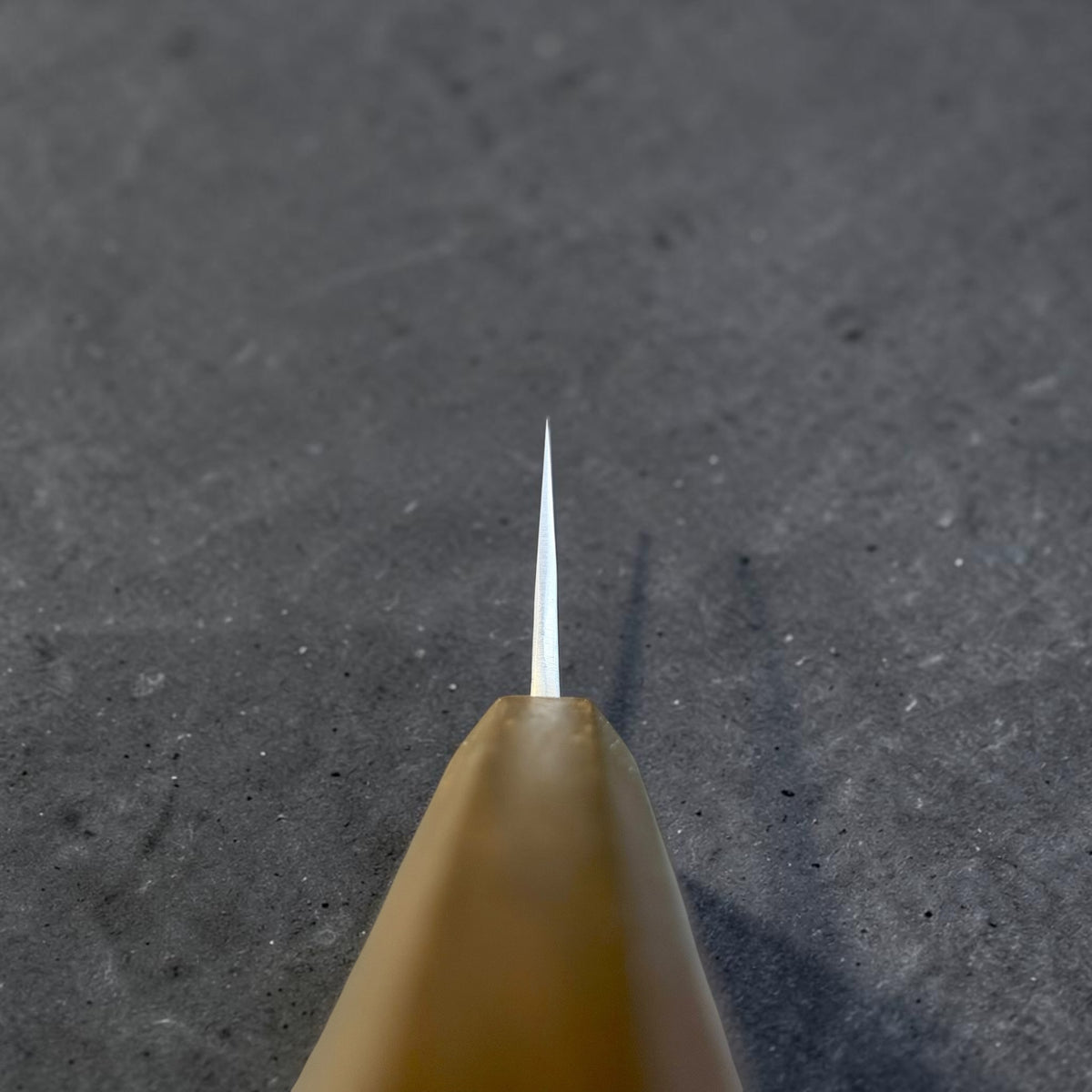 Yoshikane SKD Nashiji Gyuto 240mm choil view showing the thin grind behind the edge.