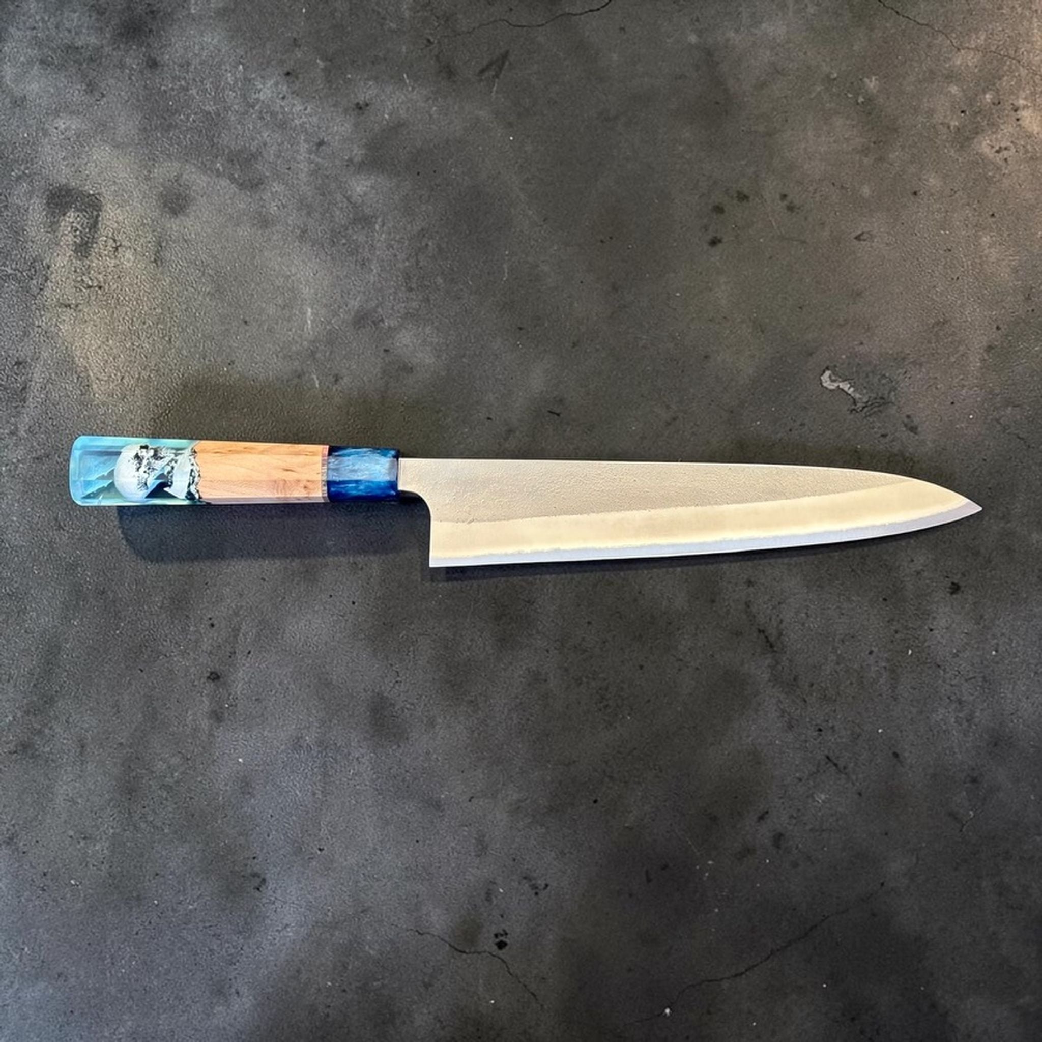 Yoshikane White #2 Nashiji Gyuto 240 mm with Prisma Blue Mountain handle, side profile view showing the 240 mm blade length and handle balance.