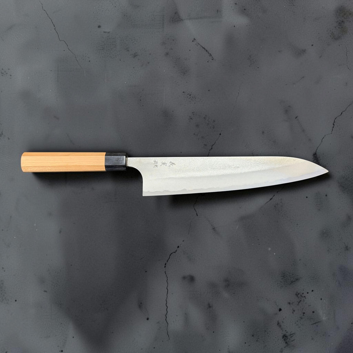 Yoshimi Kato Aogami Super Nashiji 240mm gyuto, full side profile with the CBO octagonal handle on the left.