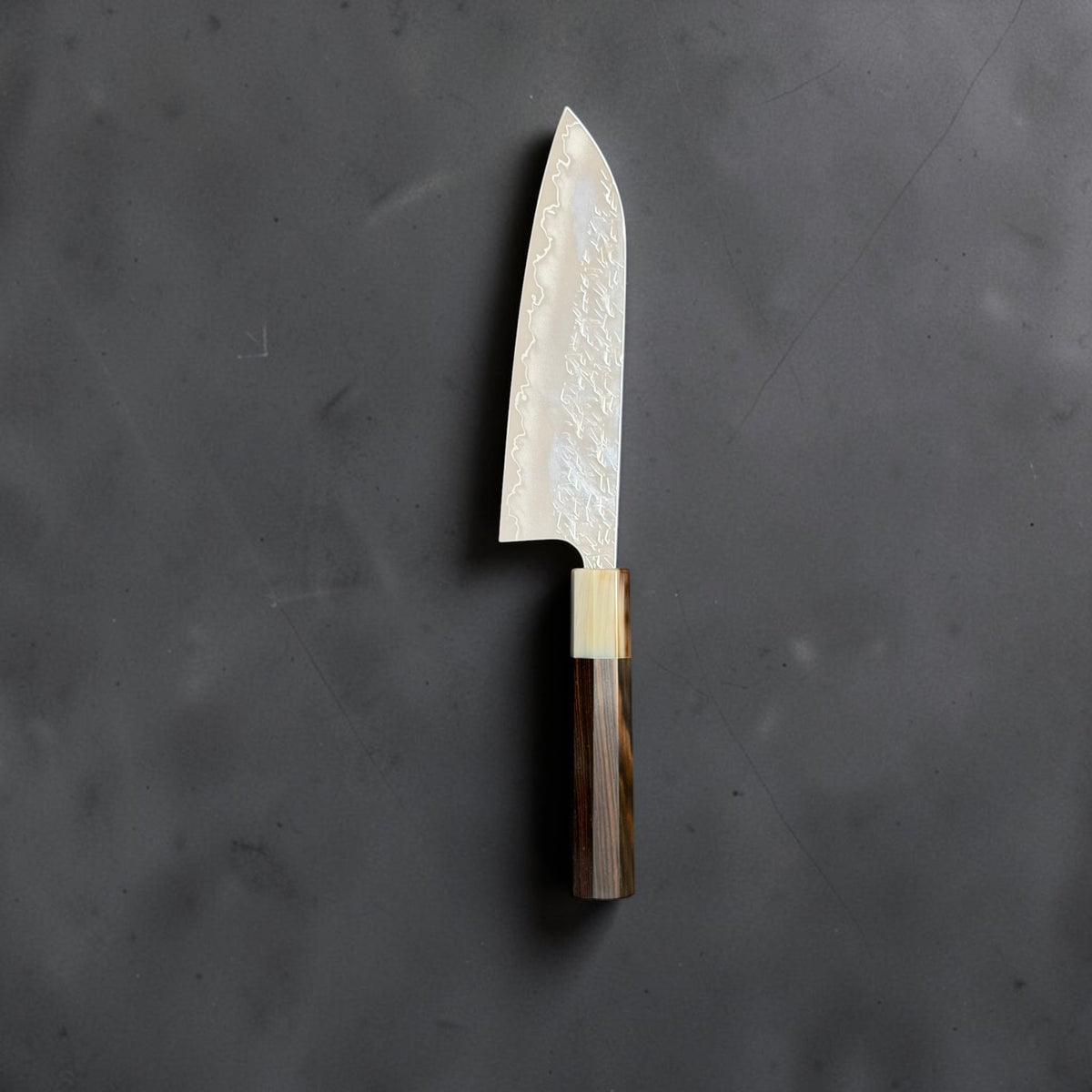 Reverse profile of Yoshimi Kato Hyo SG2 santoku showing the blade shape and handle