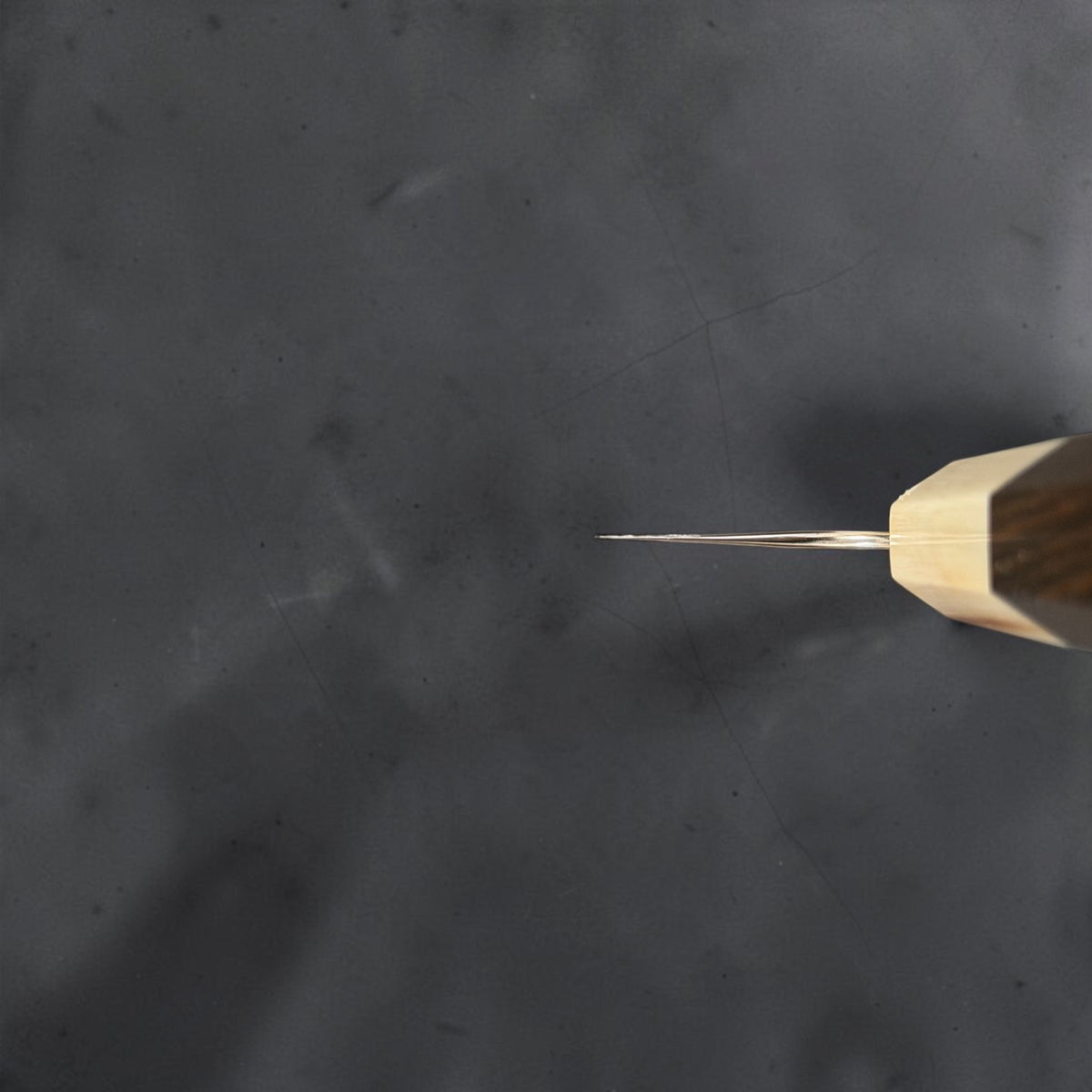 Choil view of Yoshimi Kato Hyo SG2 santoku showing the blade geometry