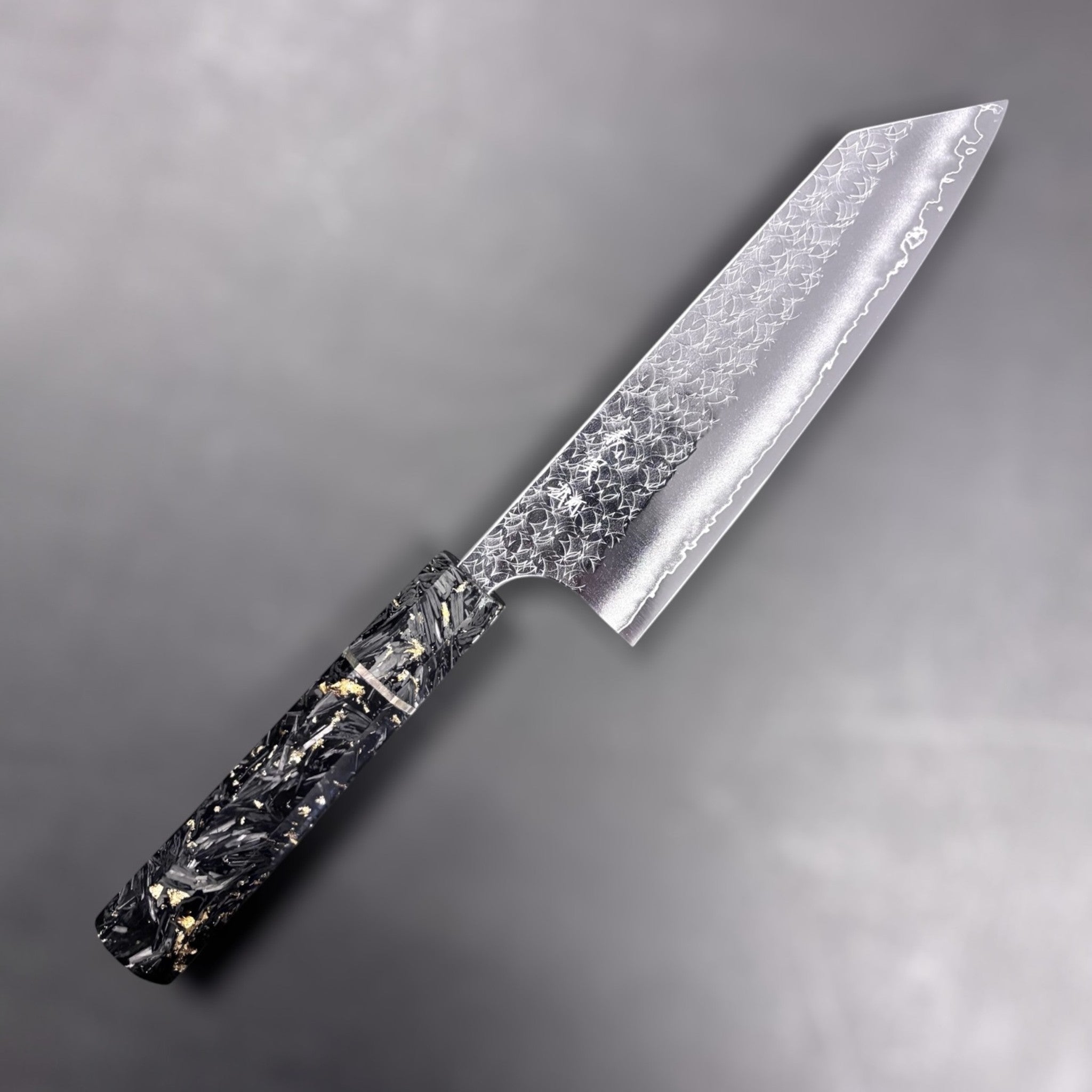 Yoshimi Kato Minamo SG2 Bunka 171 mm, angled hero shot showing hammered Minamo pattern and crisp kiritsuke-style tip.