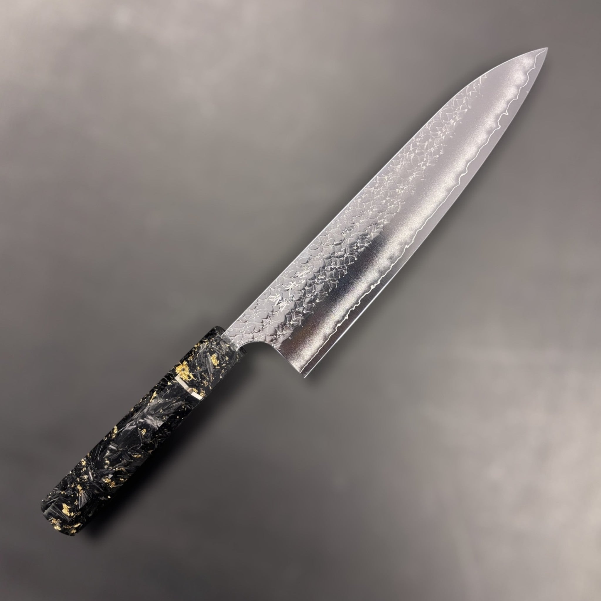 Yoshimi Kato Minamo SG2 Gyuto 210 mm, hero shot highlighting Minamo hammered pattern and stainless cladding.