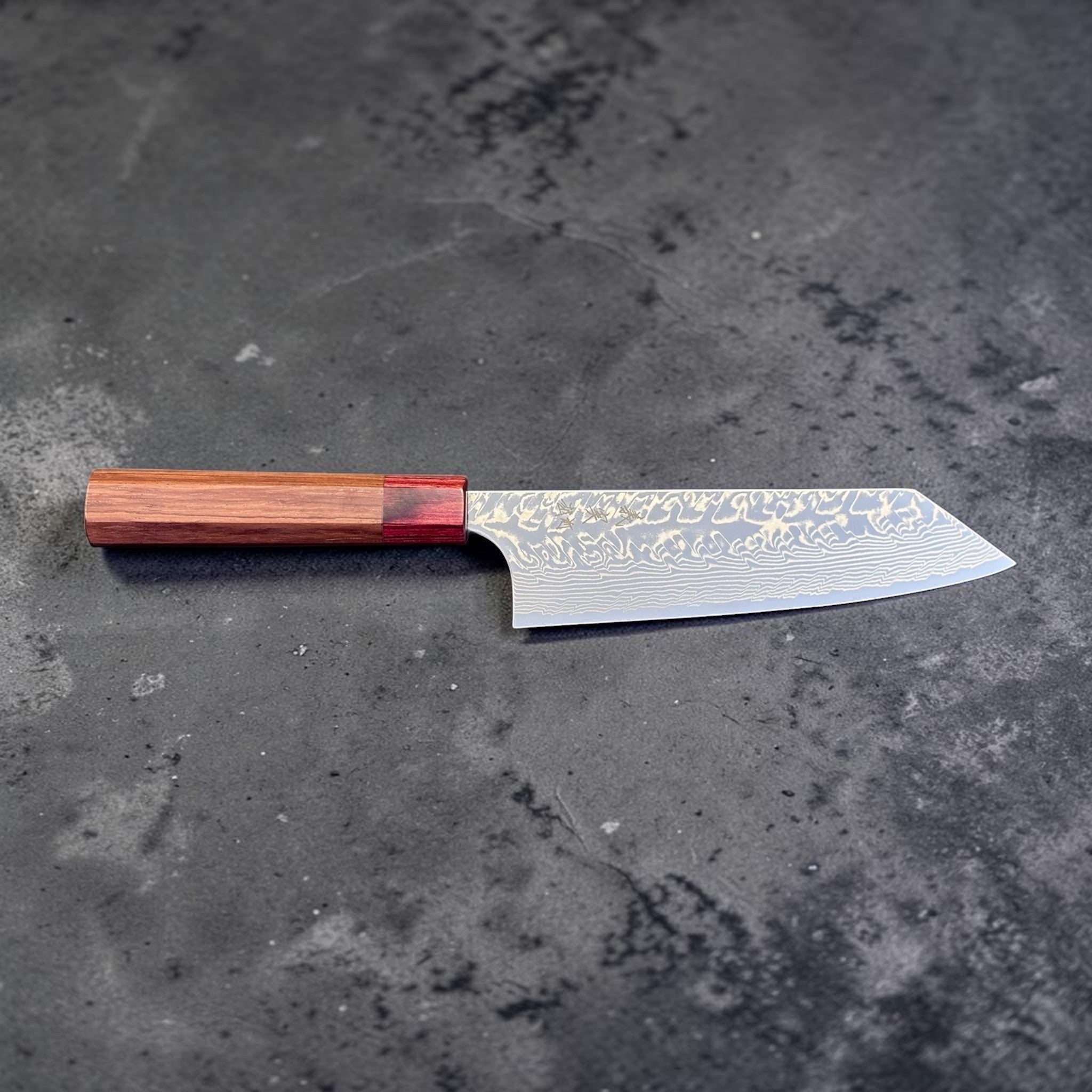 Yoshimi Kato SG2 Damascus Bunka 170 mm with Honduran wood handle and red pakkawood ferrule, side profile view.