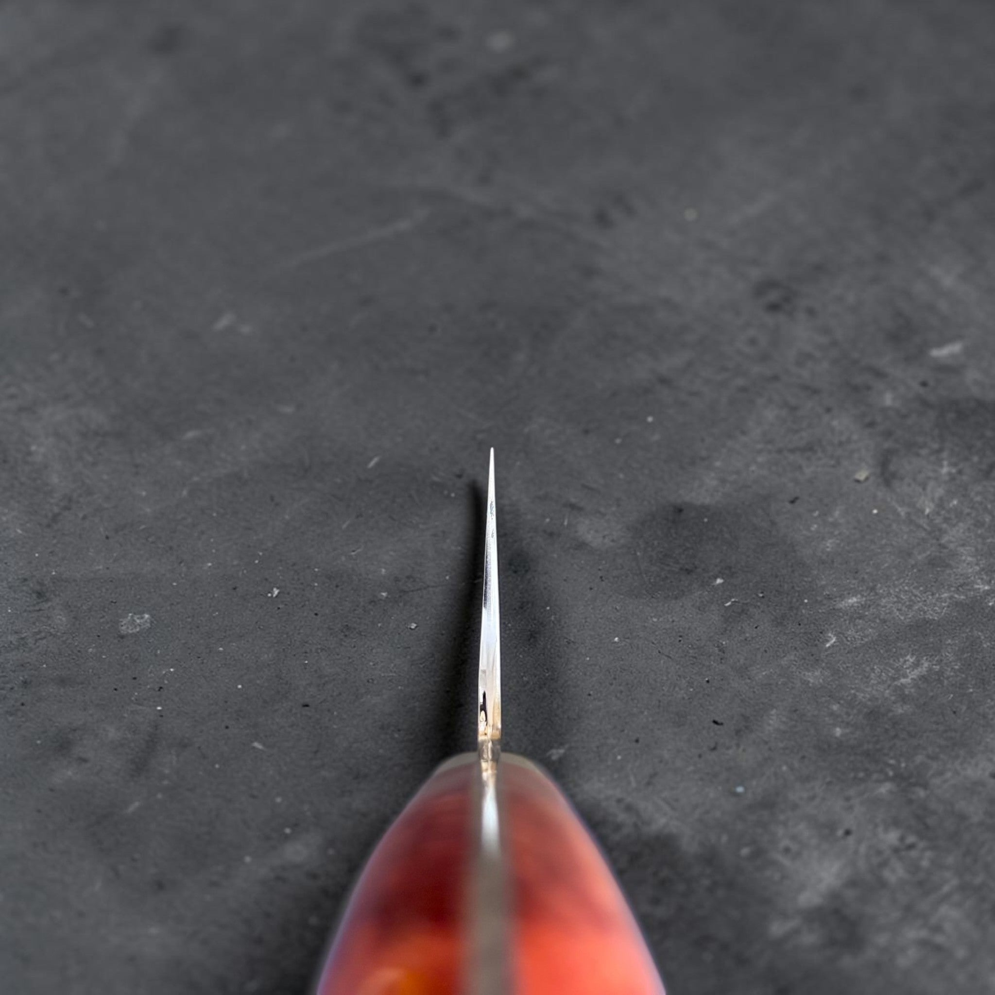 Yoshimi Kato SG2 Kaku-Tsuchime Gyuto 210 mm, choil view showing thin edge geometry.