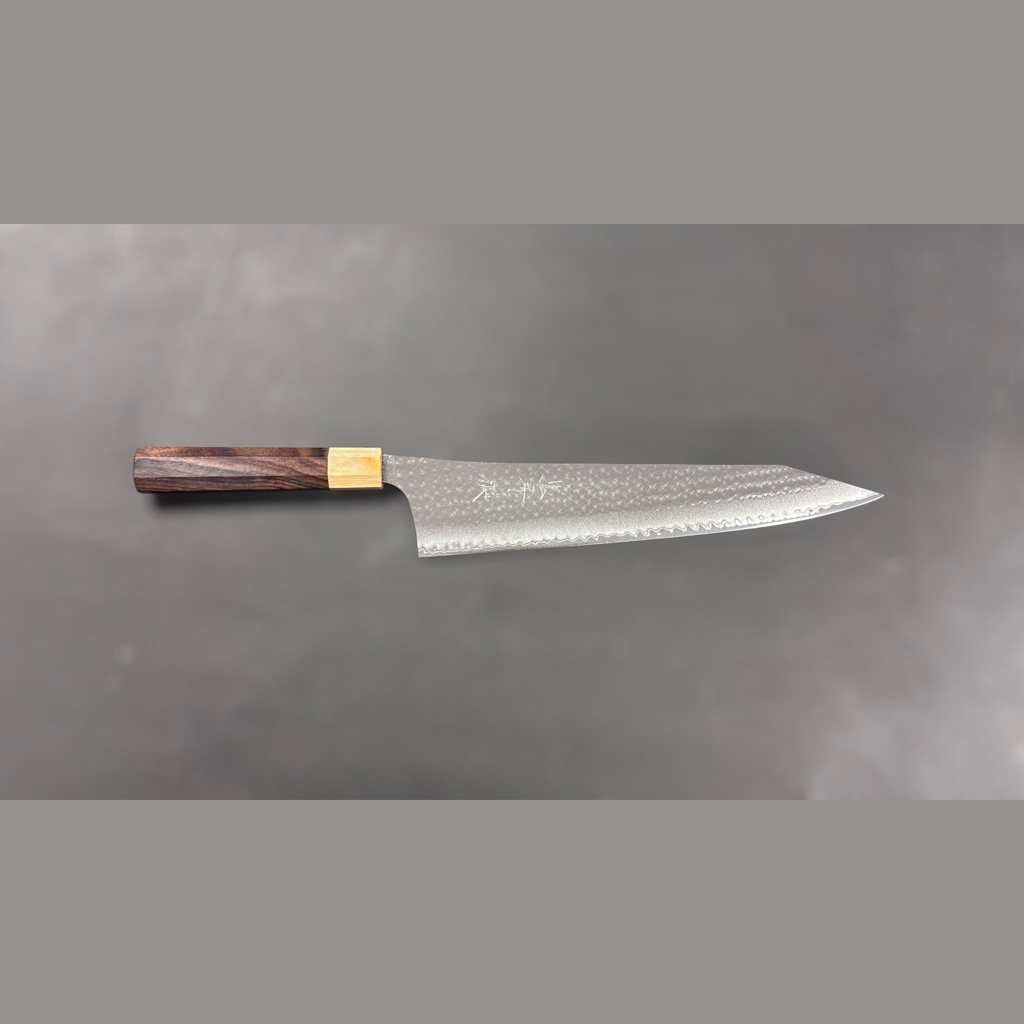 Yu Kurosaki Senko Ei SG2 Gyuto 270mm, full profile on neutral background.