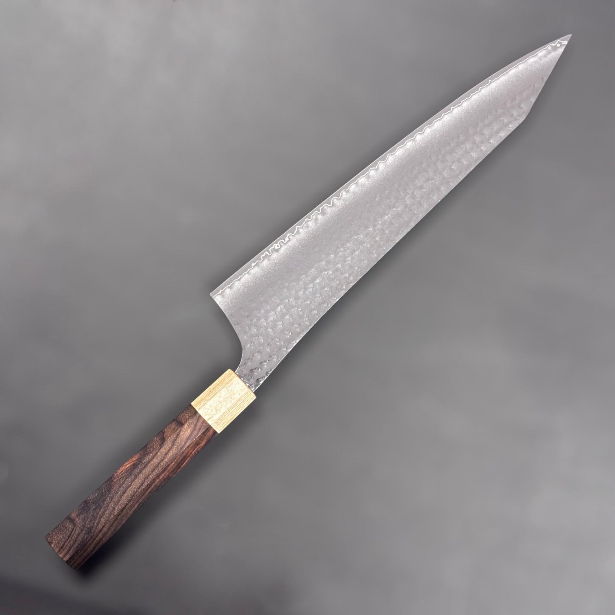 Yu Kurosaki Senko Ei SG2 Gyuto 270mm, opposite angled view with etched cladding line.