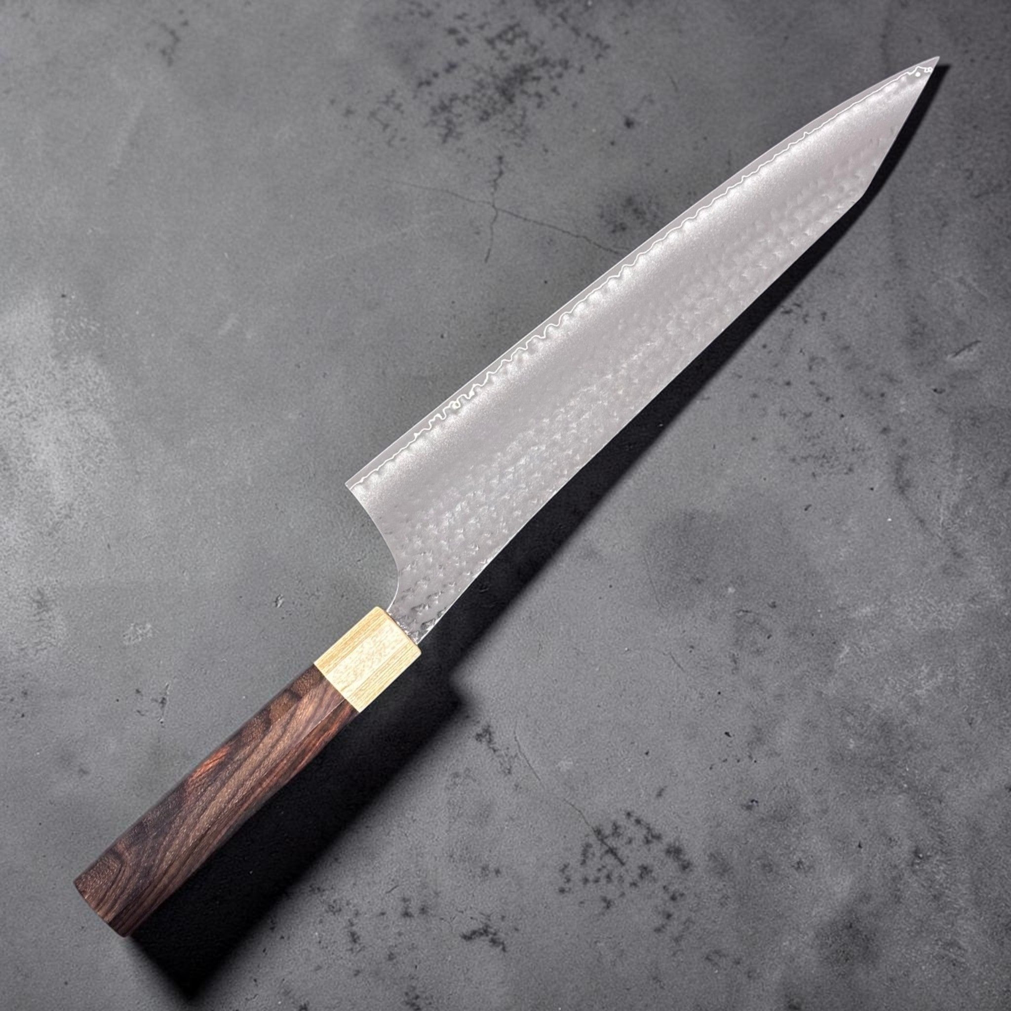 Yu Kurosaki Senko Ei SG2 Gyuto 270mm, opposite angled view with etched cladding line.