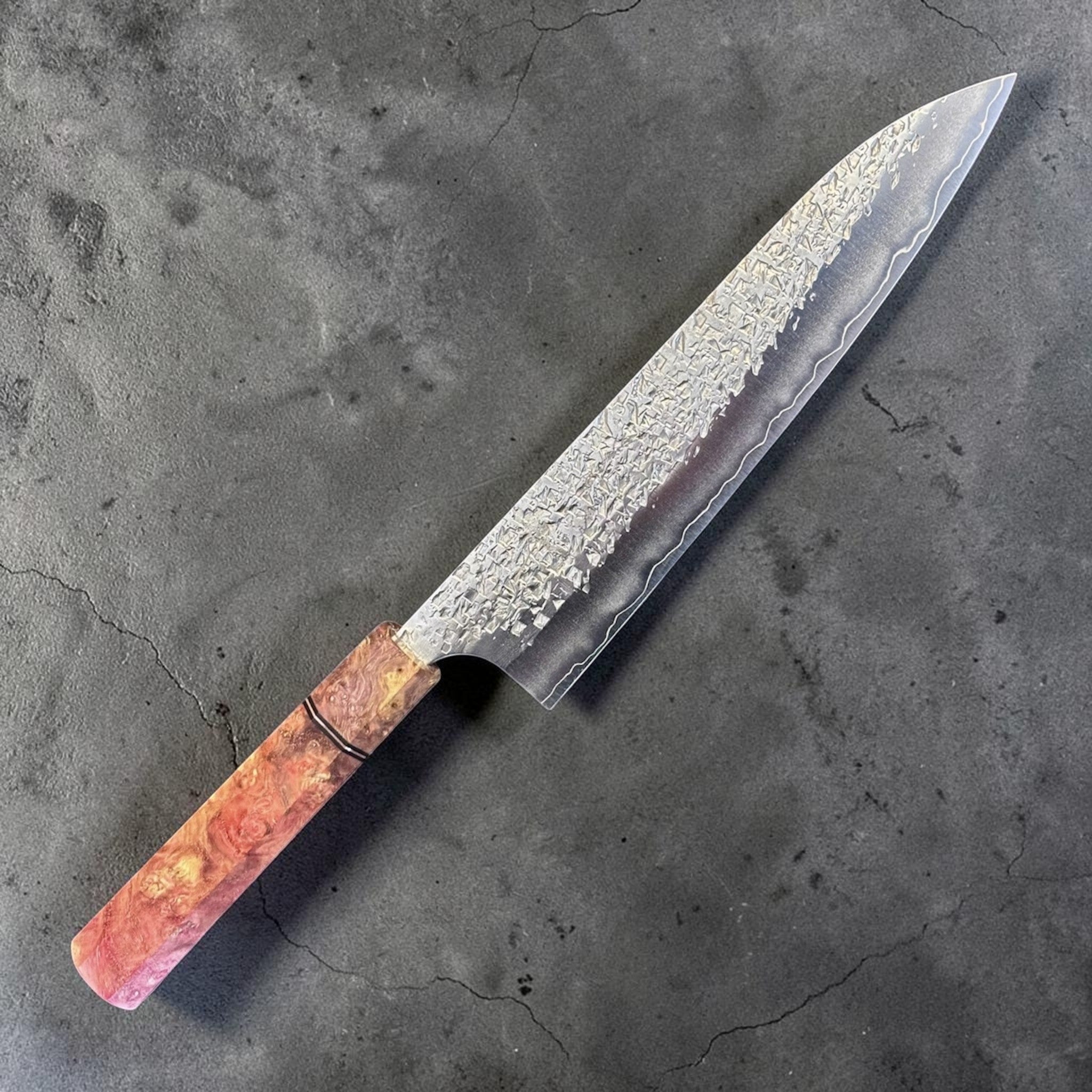 Yu Kurosaki Shizuku SG2 Gyuto 210 mm with Prisma Peachy Dream Handle, angled product photo showing the hammered Shizuku blade and peach-toned Prisma custom handle.