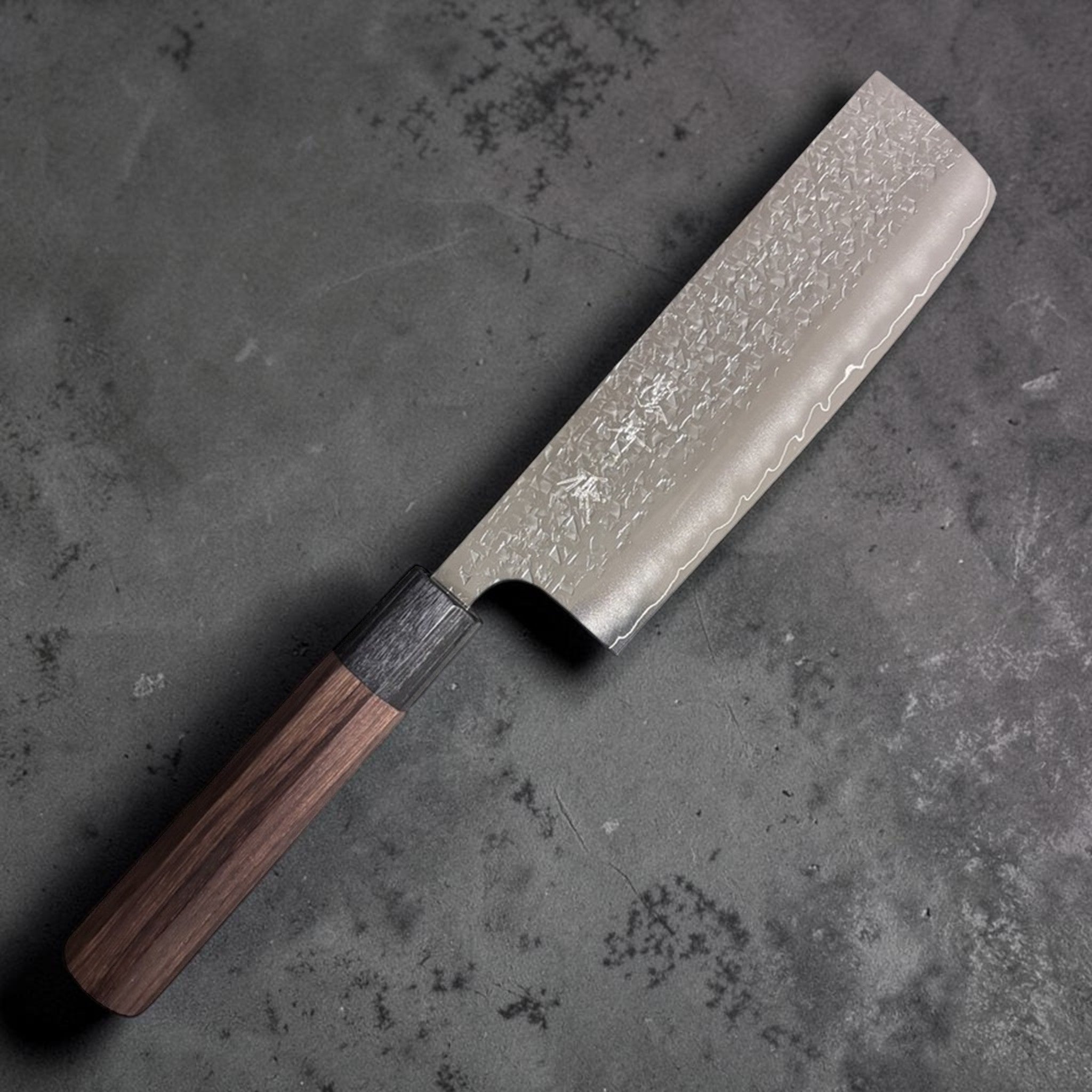 Yu Kurosaki Shizuku SG2 Nakiri 165 mm, right side blade view showing raindrop hammered finish and walnut wa handle on white background.