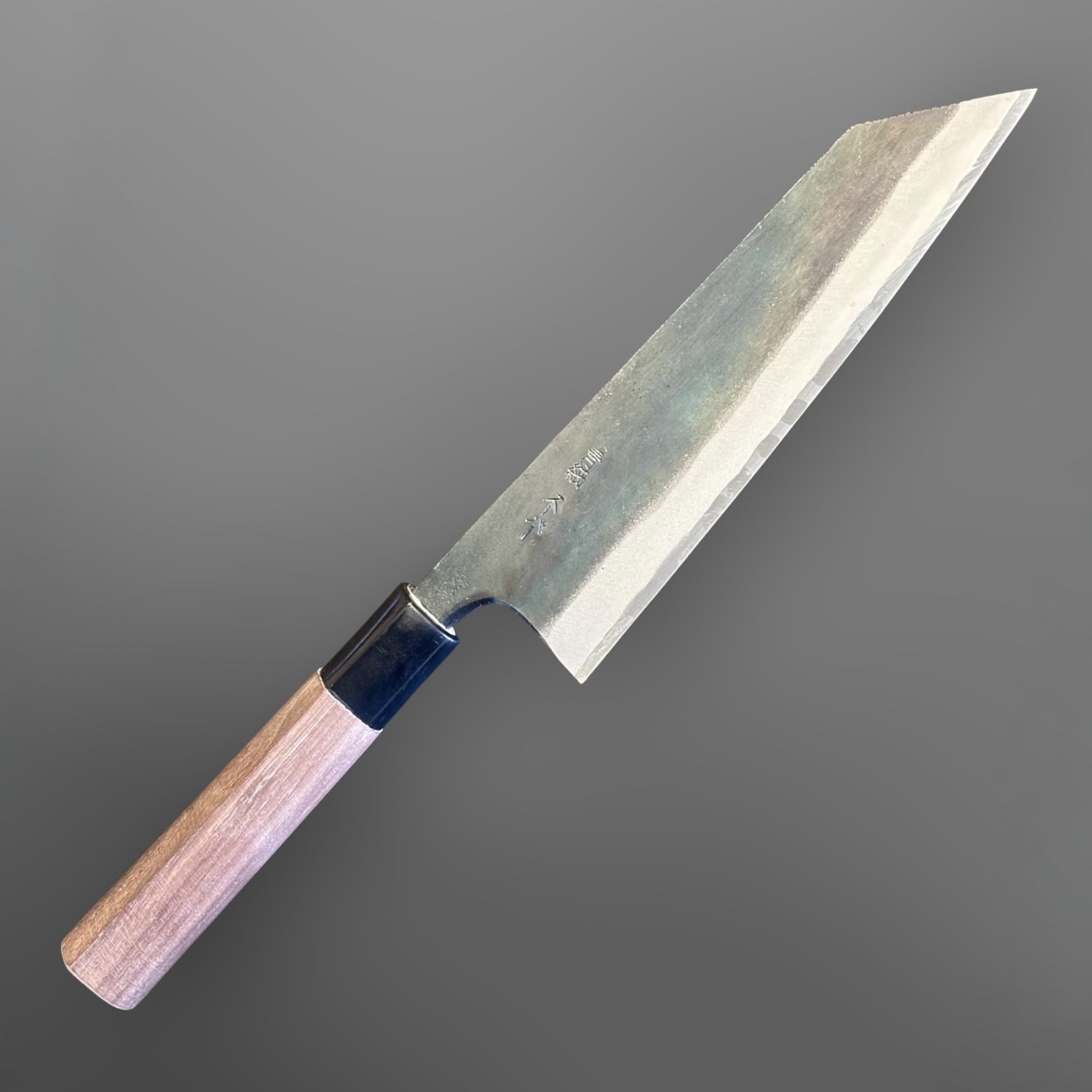 Zakuri AS Kurouchi Bunka 165 mm with kurouchi finish and wa handle, angled blade view showing the kurouchi finish.
