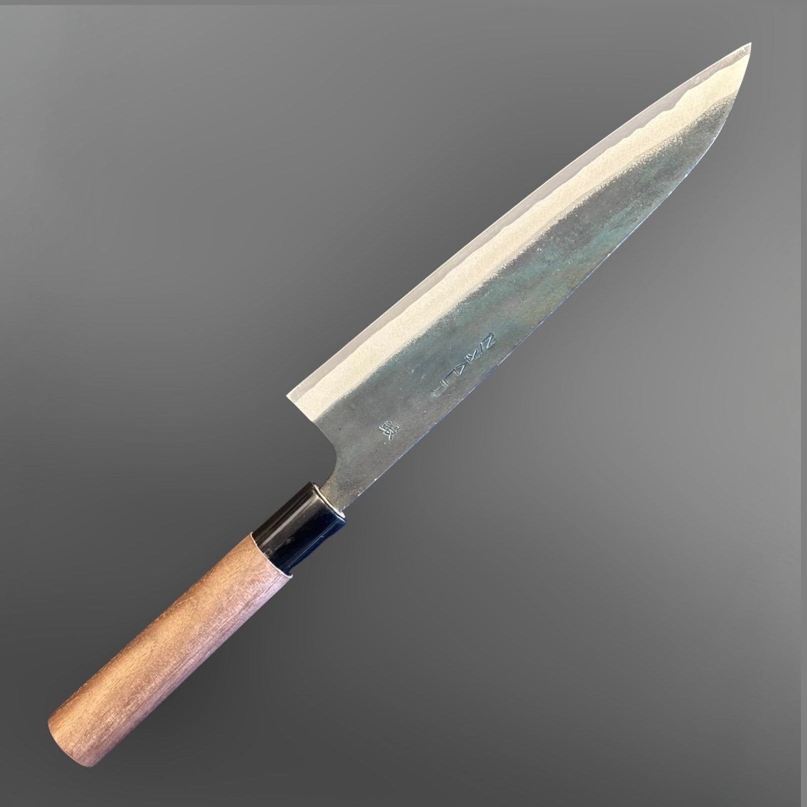 Zakuri AS Kurouchi Gyuto 210 mm, alternate side profile showing the kurouchi finish, bright bevel, and wa handle.