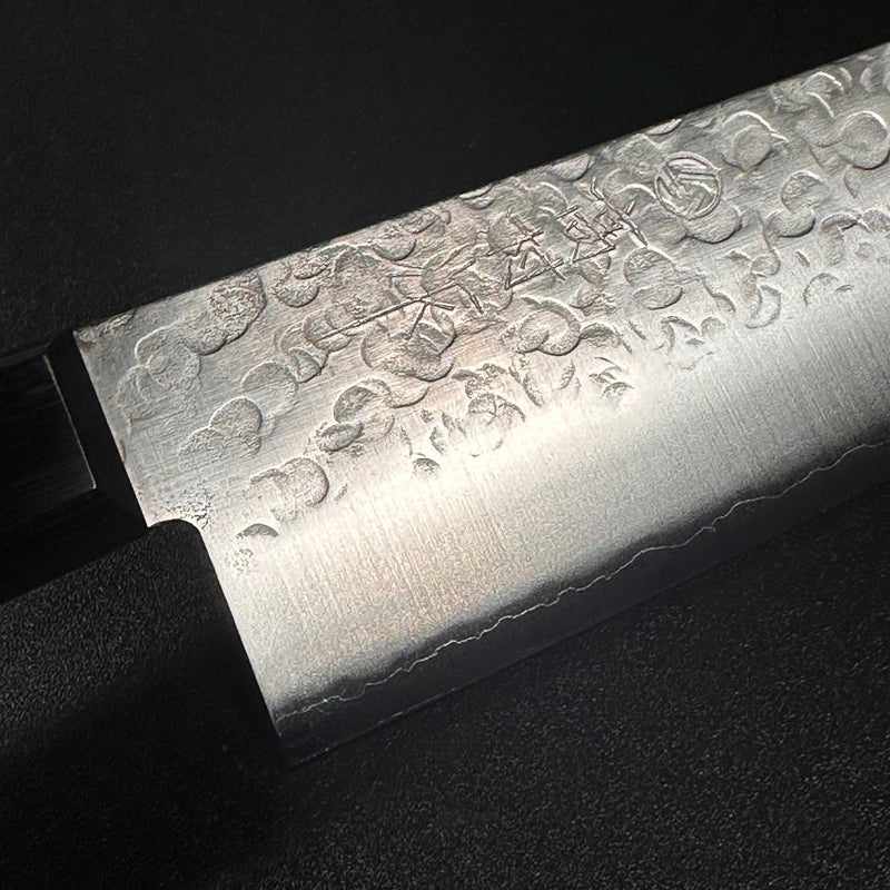 Takamura Stainless Clad Chromax Tsuchime 170mm Santoku with Black Pakkawood Scales Western Style Handle Tokushu Knife.