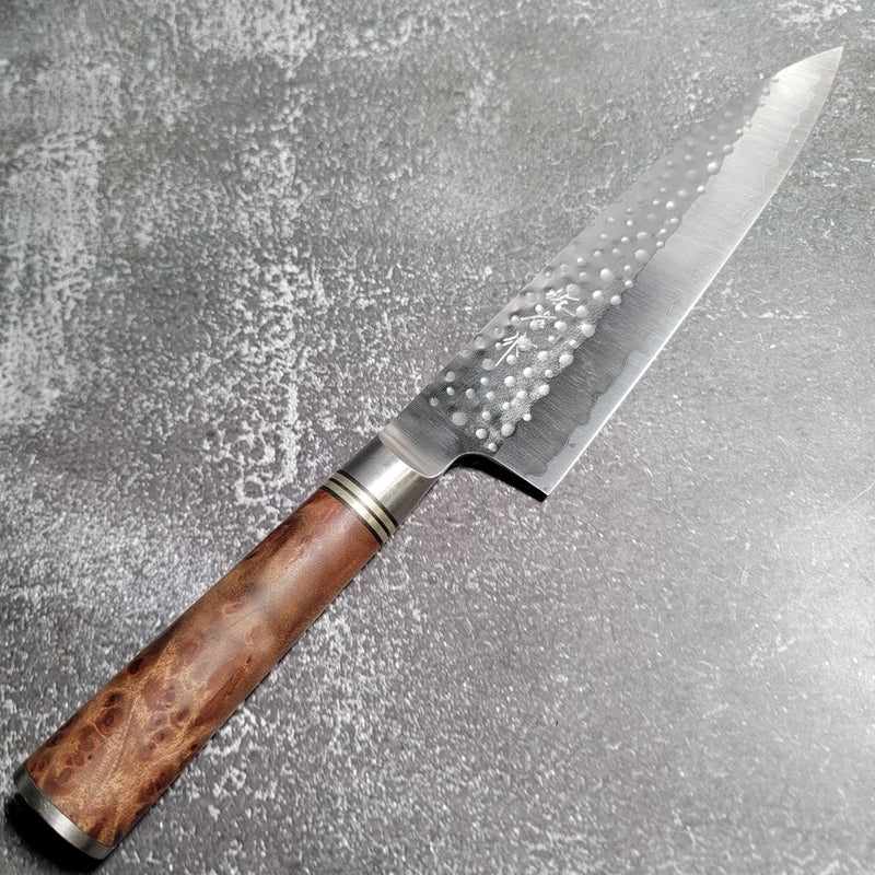 http://tokushuknife.com/cdn/shop/products/takeshi-saji-sg2-tsuchime-210mm-gyuto-with-chinese-quince-wood-handle-987563.jpg?v=1702910673