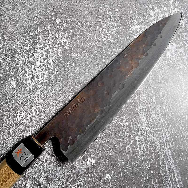 Teruyasu Fujiwara Denka Stainless Clad Kurouchi Tsuchime 240mm Gyuto with Magnolia and Horn Wa Handle Tokushu Knife.