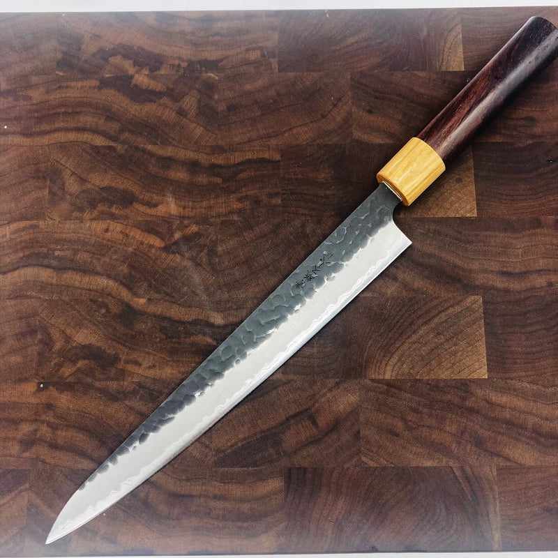 Tsunehisa Stainless Clad Aogami Super Kurouchi Tsuchime 240mm Sujihiki Slicer with Wa Circle Rosewood and White Handle Tokushu Knife.