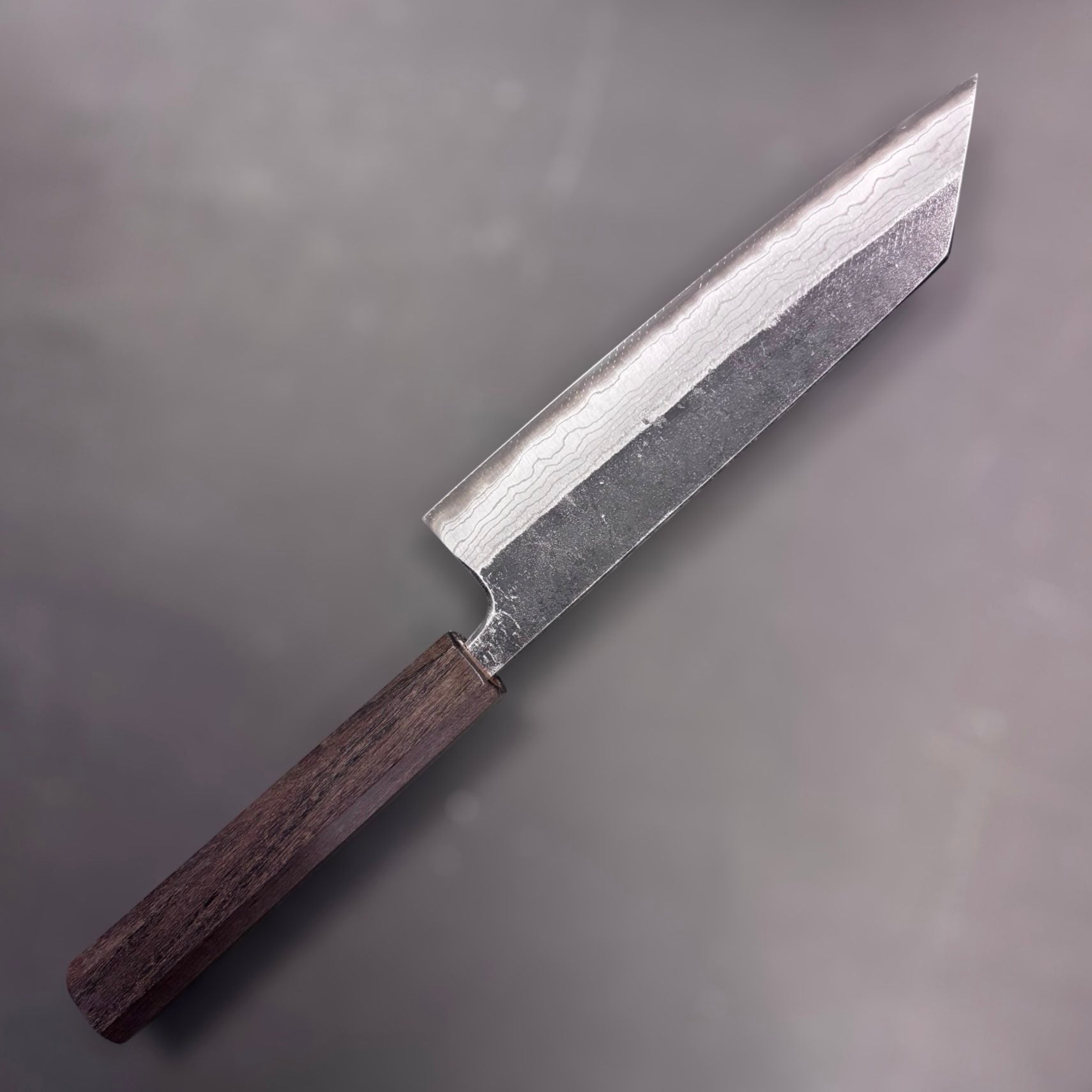 Hatsukokoro Kumokage Blue #2 Bunka 180 mm, left side  reverse‑tanto tip profile showing cloudy damascus pattern.