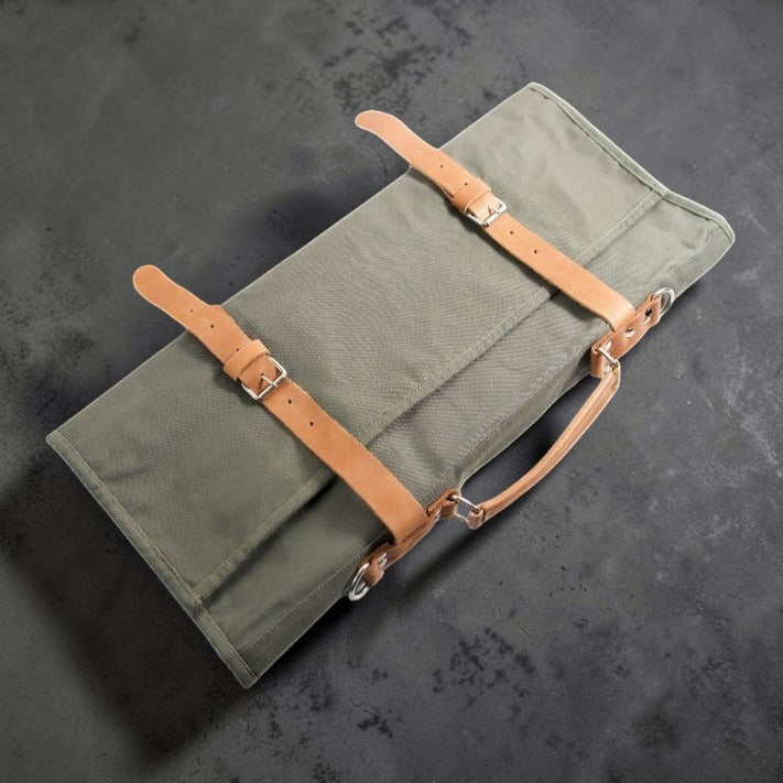 Olive canvas knife roll with tan straps