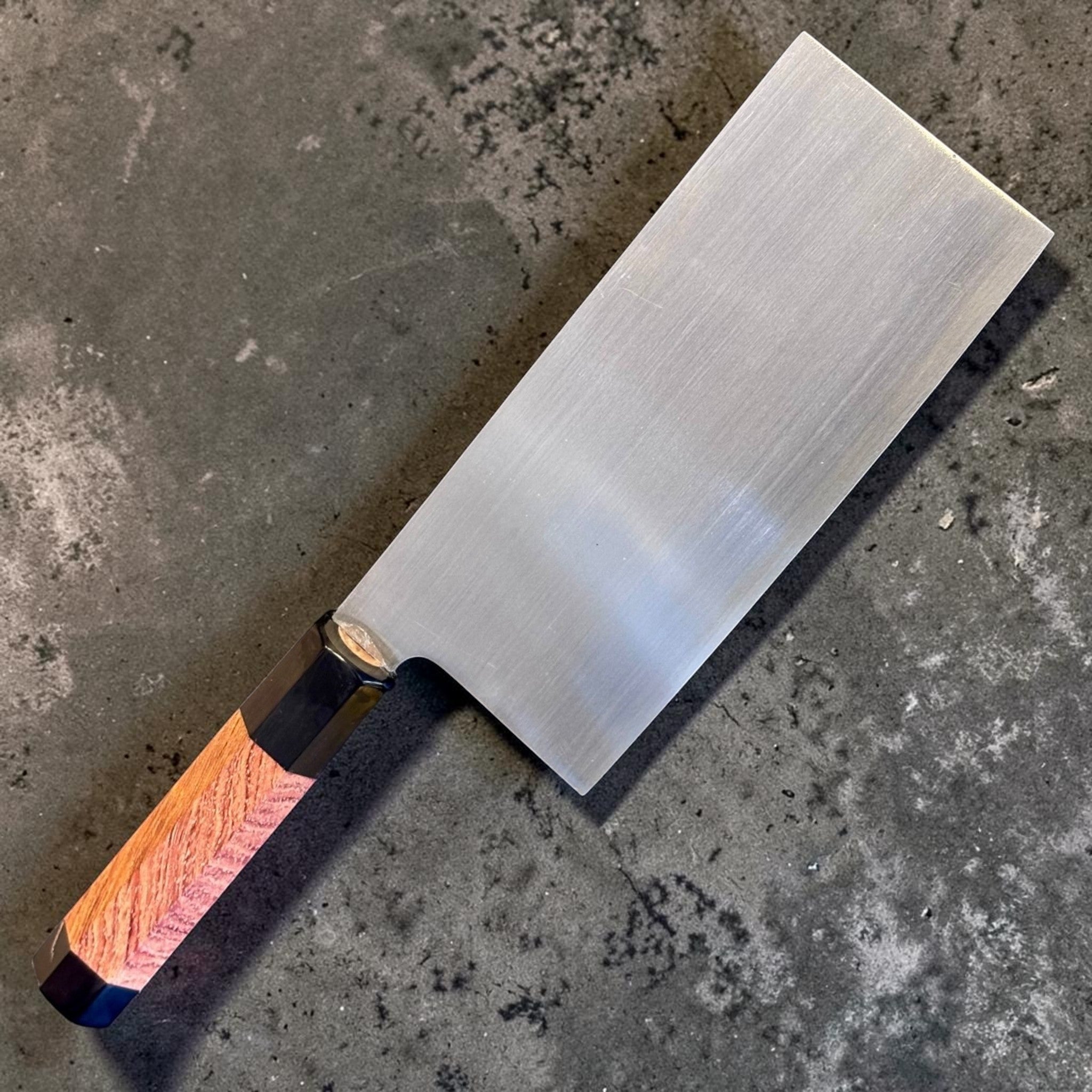 Fook Kee Model #3 stainless steel 180 mm Chinese vegetable cleaver with custom wa handle and buffalo horn accents, angled full-knife view.