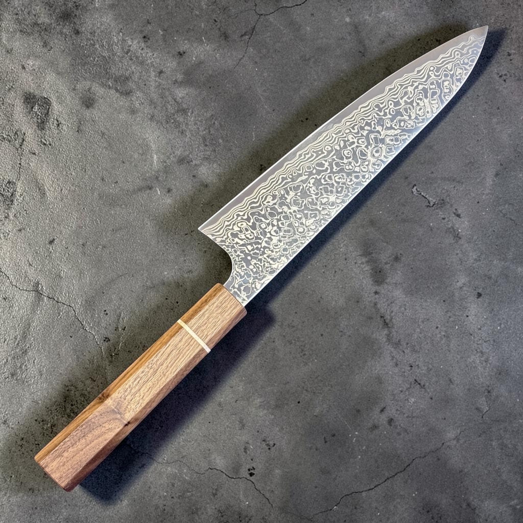 Hatsukokoro Ginga ATS-34 Nickel Damascus Gyuto 210 mm with Sanjo walnut handle and maple stripe, blade-side view emphasizing the nickel Damascus finish.