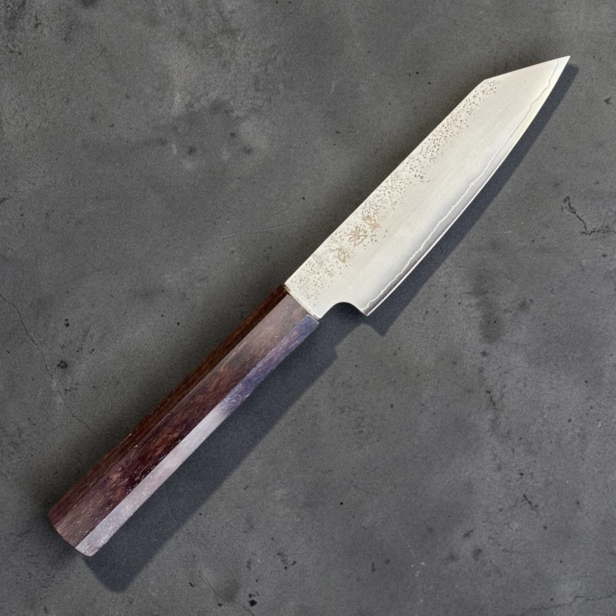 Hatsukokoro Ginrei Silver #3 Kiritsuke Petty 125 mm, angled blade and handle view with hammered finish detail.