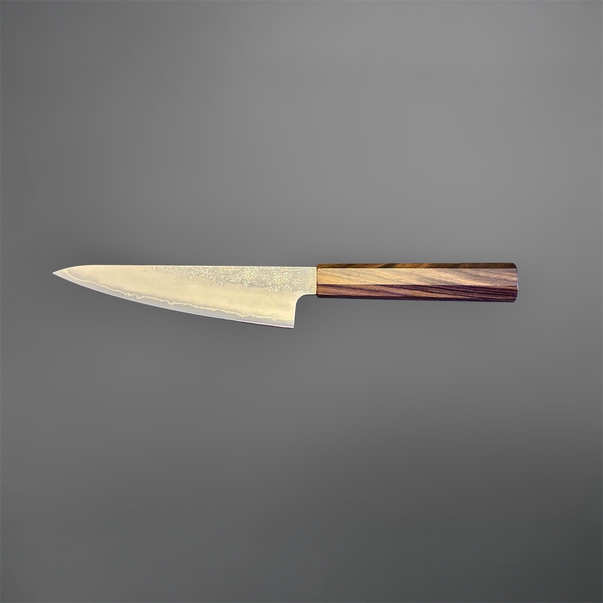 Hatsukokoro Ginrei Silver #3 Ko Santoku 150 mm with mono ebony handle, reverse side profile with textured blade finish.