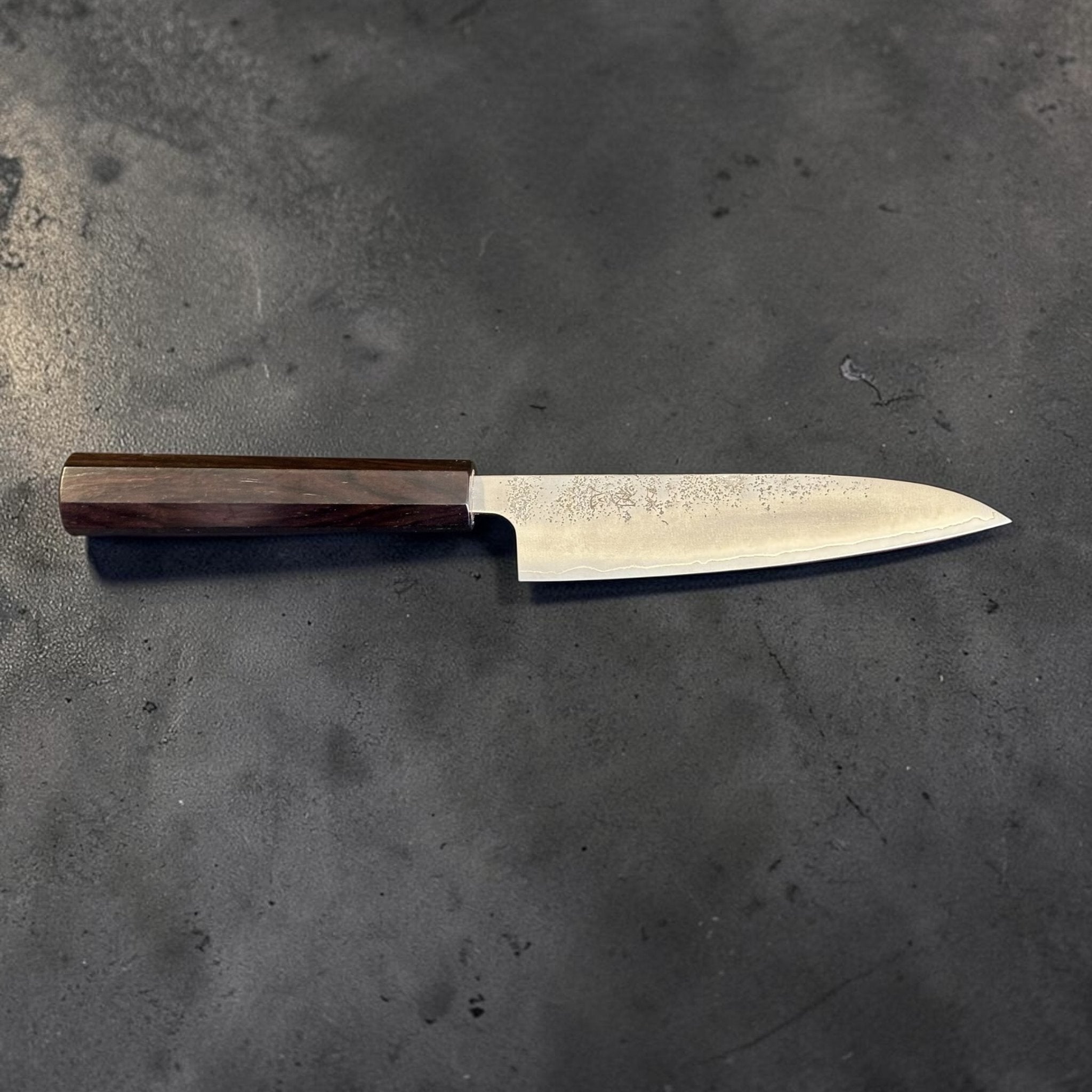 Hatsukokoro Ginrei Silver #3 Petty 130 mm with mono ebony handle, right-facing full profile view.