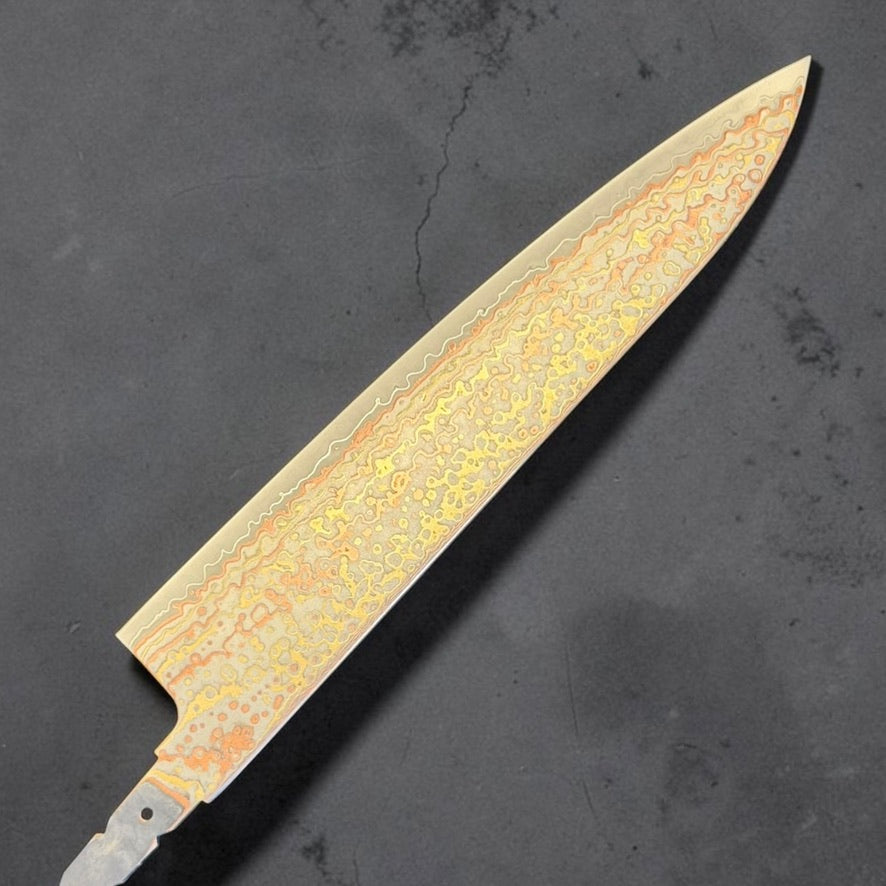 Hatsukokoro Hinotori V-Toku2 Rainbow Damascus Gyuto 210mm blade only, reverse side showing the etched rainbow Damascus pattern.