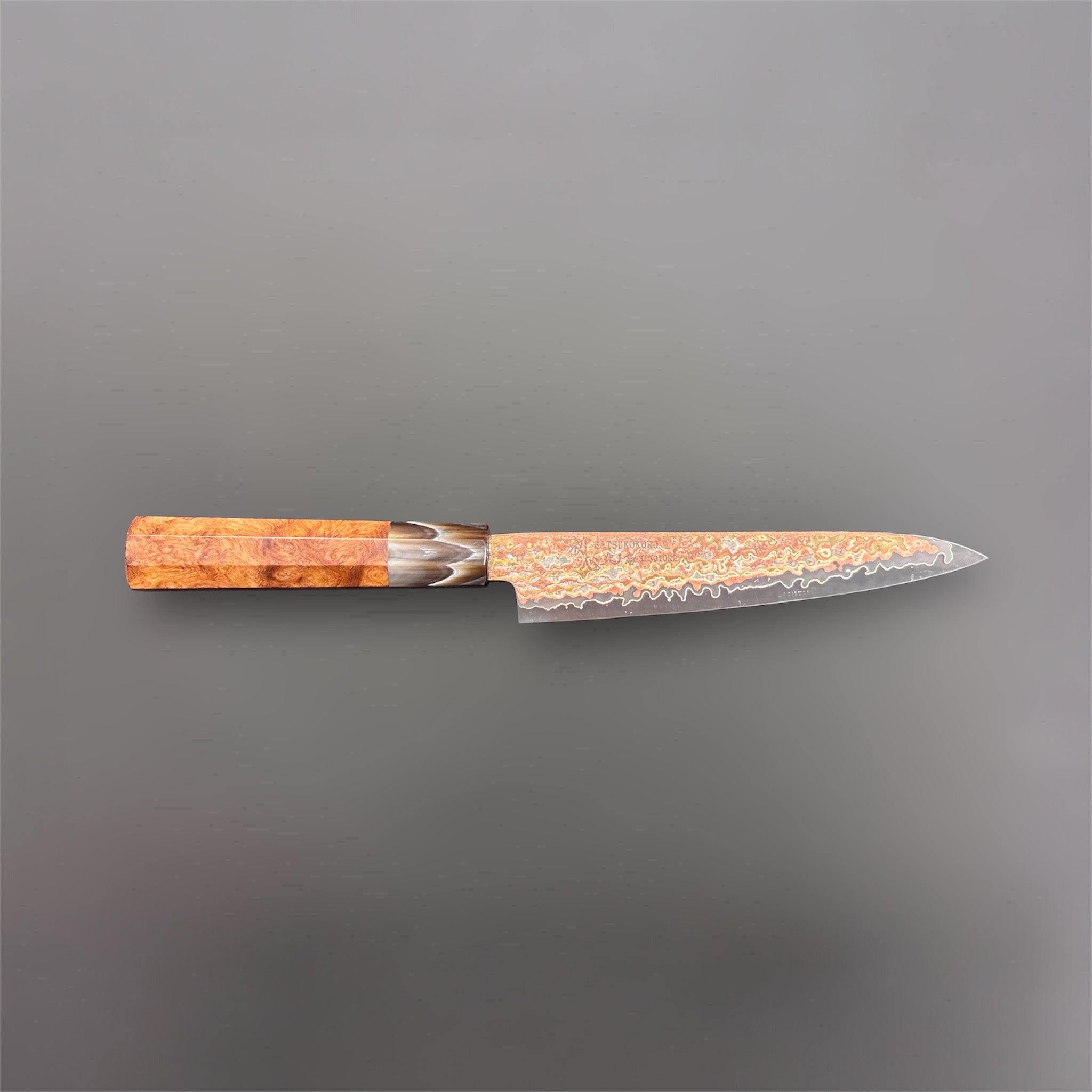Hatsukokoro Hinotori V-Toku2 Rainbow Damascus Petty 150 mm with Amboyna Burl handle, side profile full-length product photo.