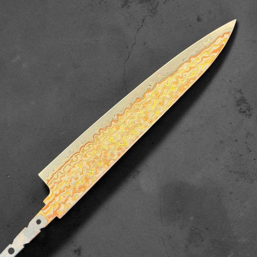 Hatsukokoro Hinotori V-Toku2 Rainbow Damascus Petty 150mm blade only, front side showing the utility knife profile and layered copper and brass Damascus.