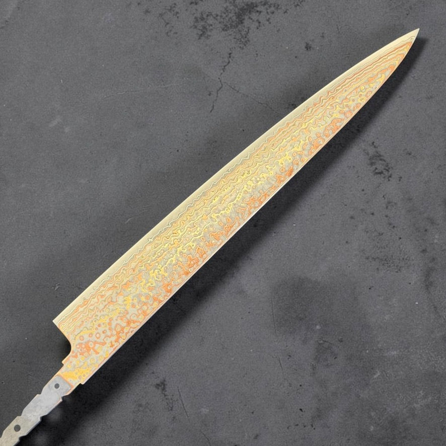 Hatsukokoro Hinotori V-Toku2 Rainbow Damascus Sujihiki 270mm blade only, reverse side showing copper and brass layered Damascus.