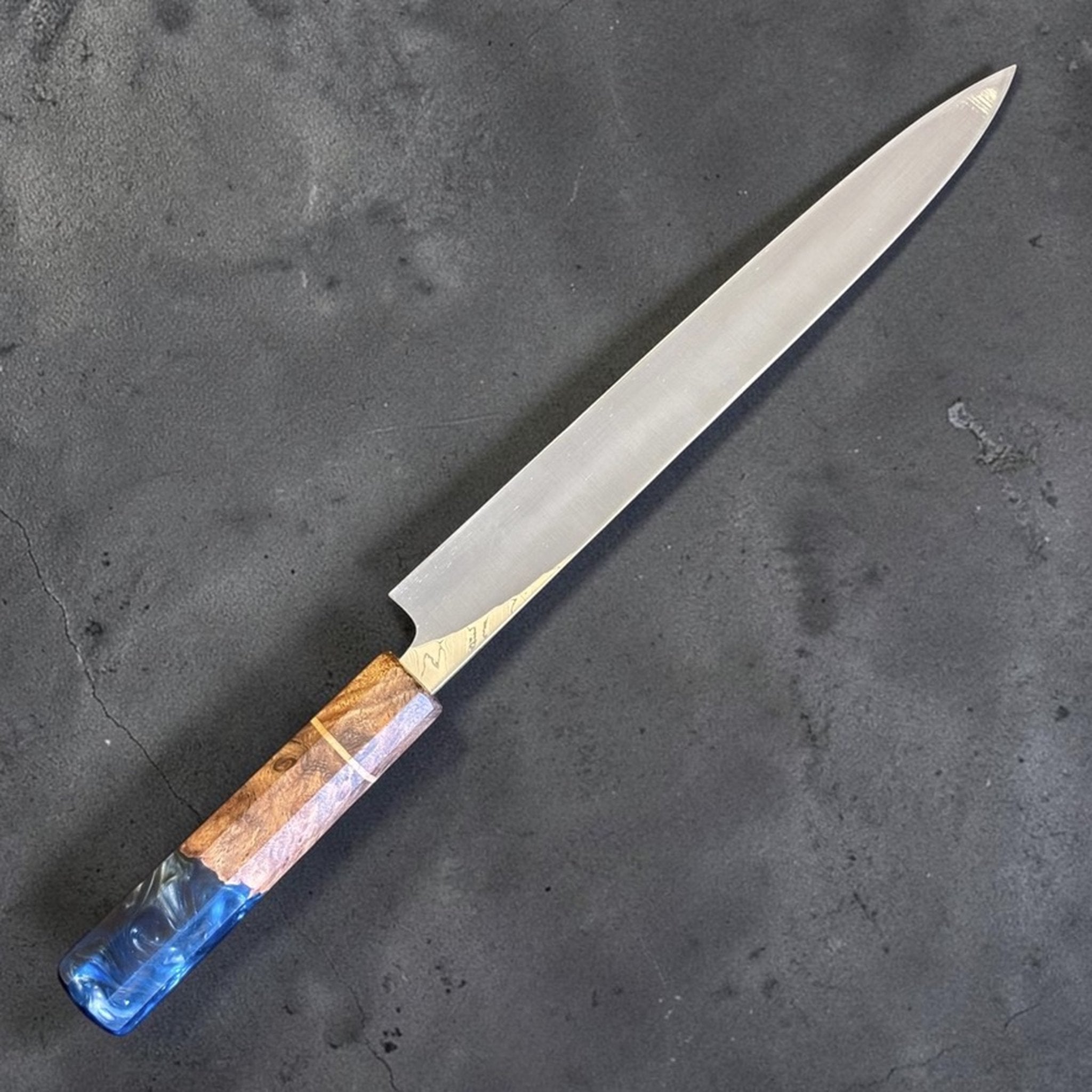Hatsukokoro Hyomon White #2 Damascus Yanagiba 270 mm with Prisma Knife Handle, reverse angled blade view.