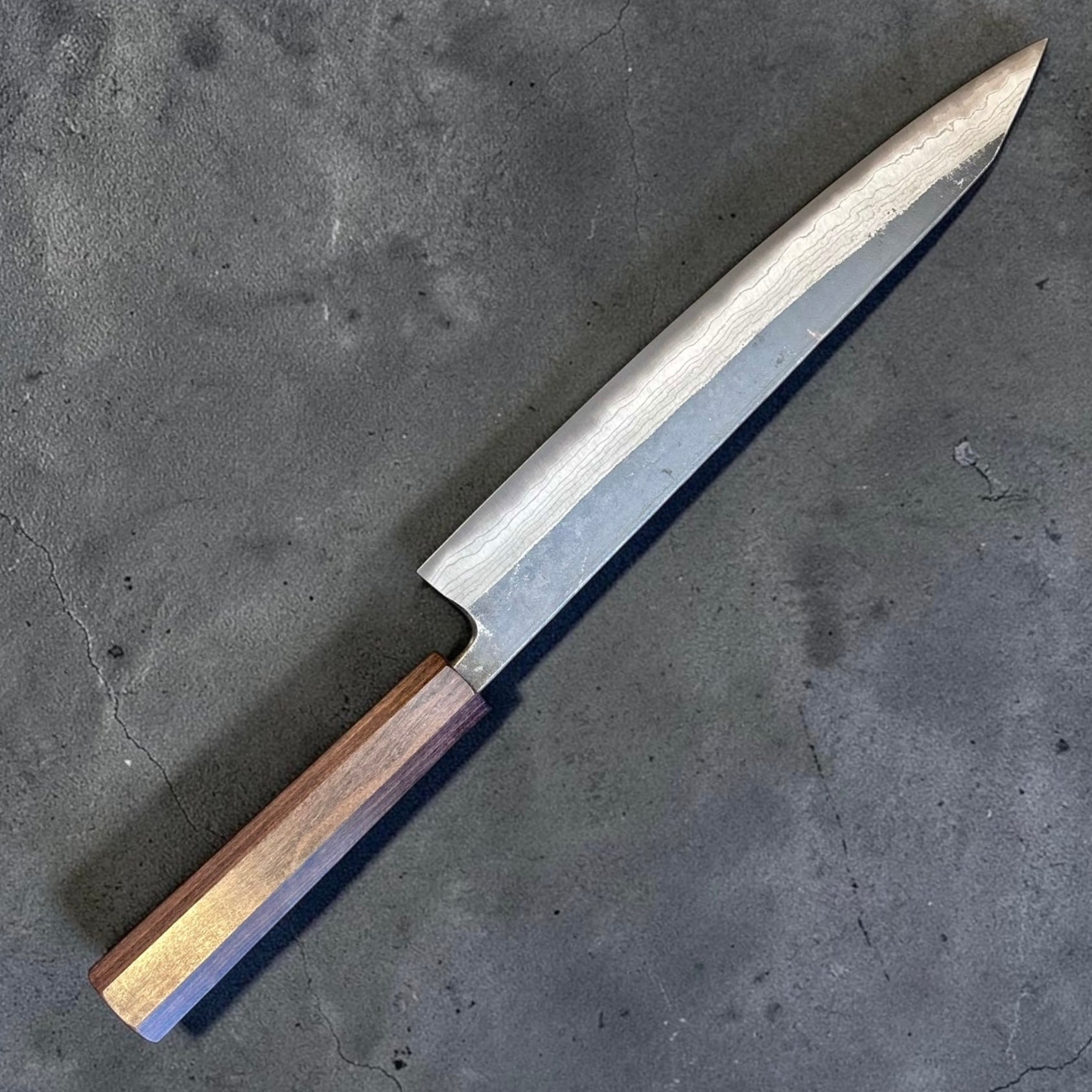 Reverse side of Hatsukokoro Kumokage Blue #2 Damascus 255mm Sujihiki