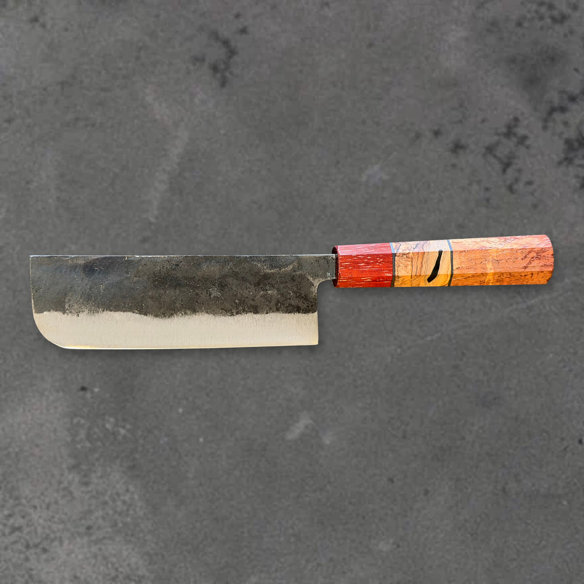 Hatsukokoro Kurogane Blue #2 Kurouchi 120mm nakiri with Prisma handle, shown in horizontal reverse profile with the full blade and handle visible. #Handle_Prisma