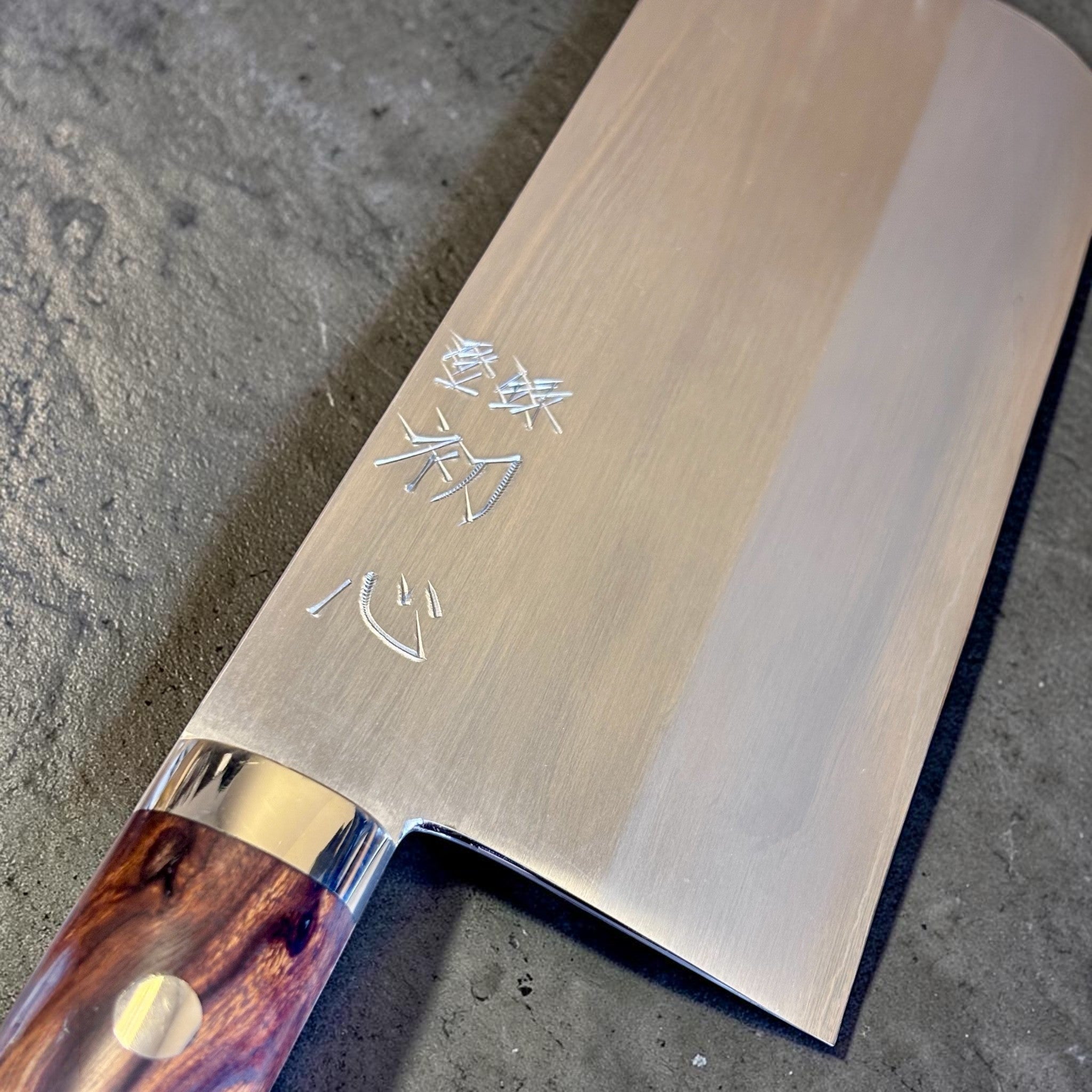 Hatsukokoro Nakagawa Satoshi Silver #3 Chinese Cleaver with ironwood handle, close-up of the blade face, kanji engraving, choil area, and ironwood handle.