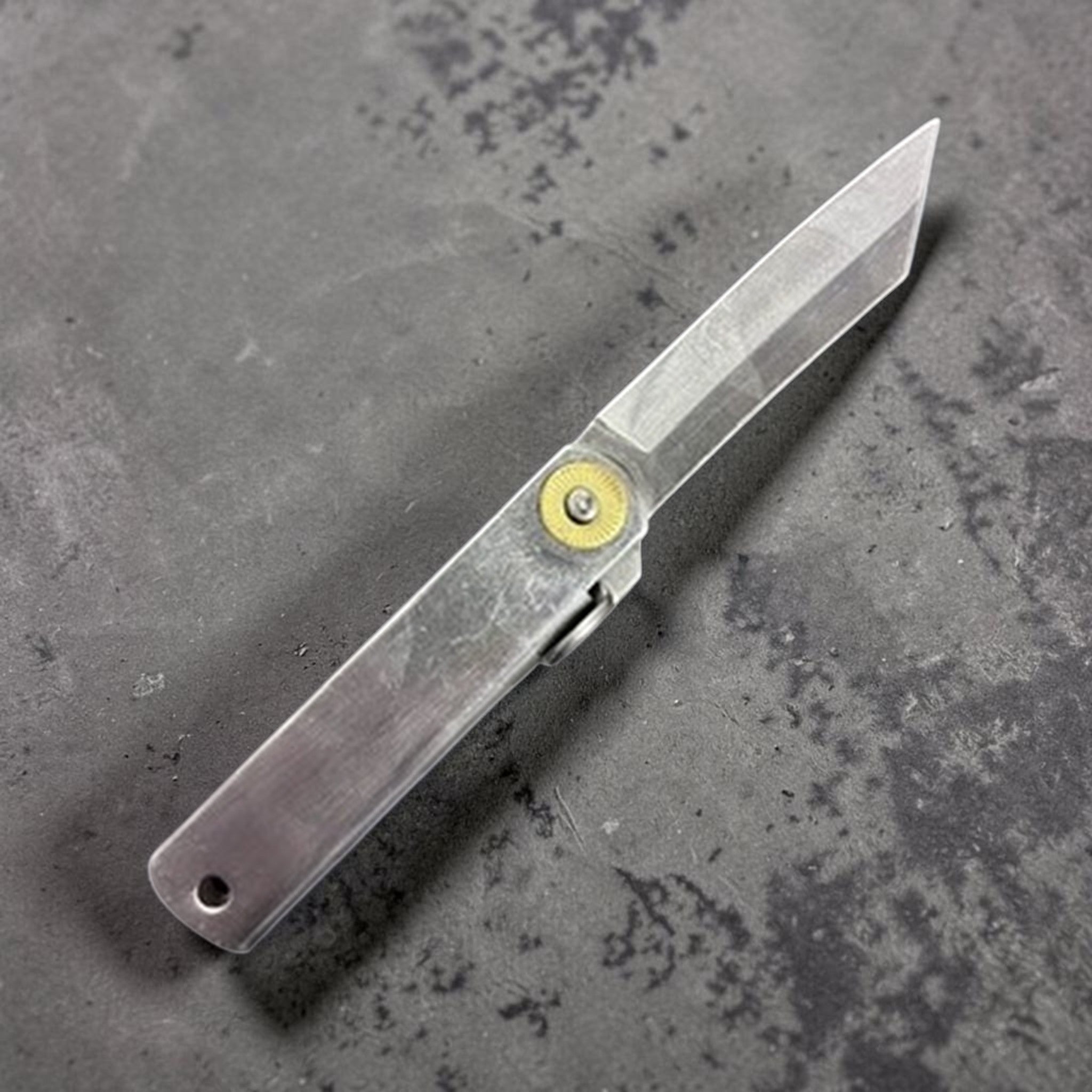 Higonokami VG‑10 Japanese pocket knife (Small), full profile shot with tanto-style tip and satin finish.