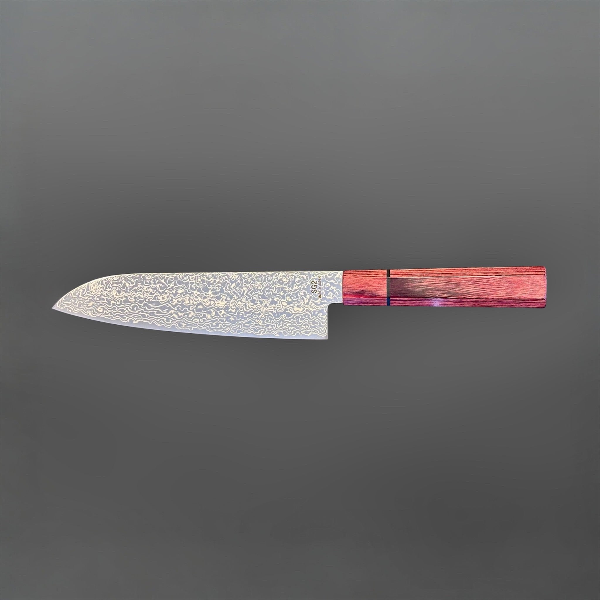 Higuchi SG2 Damascus Santoku 180 mm with red pakkawood handle, reverse side profile view with Damascus pattern.