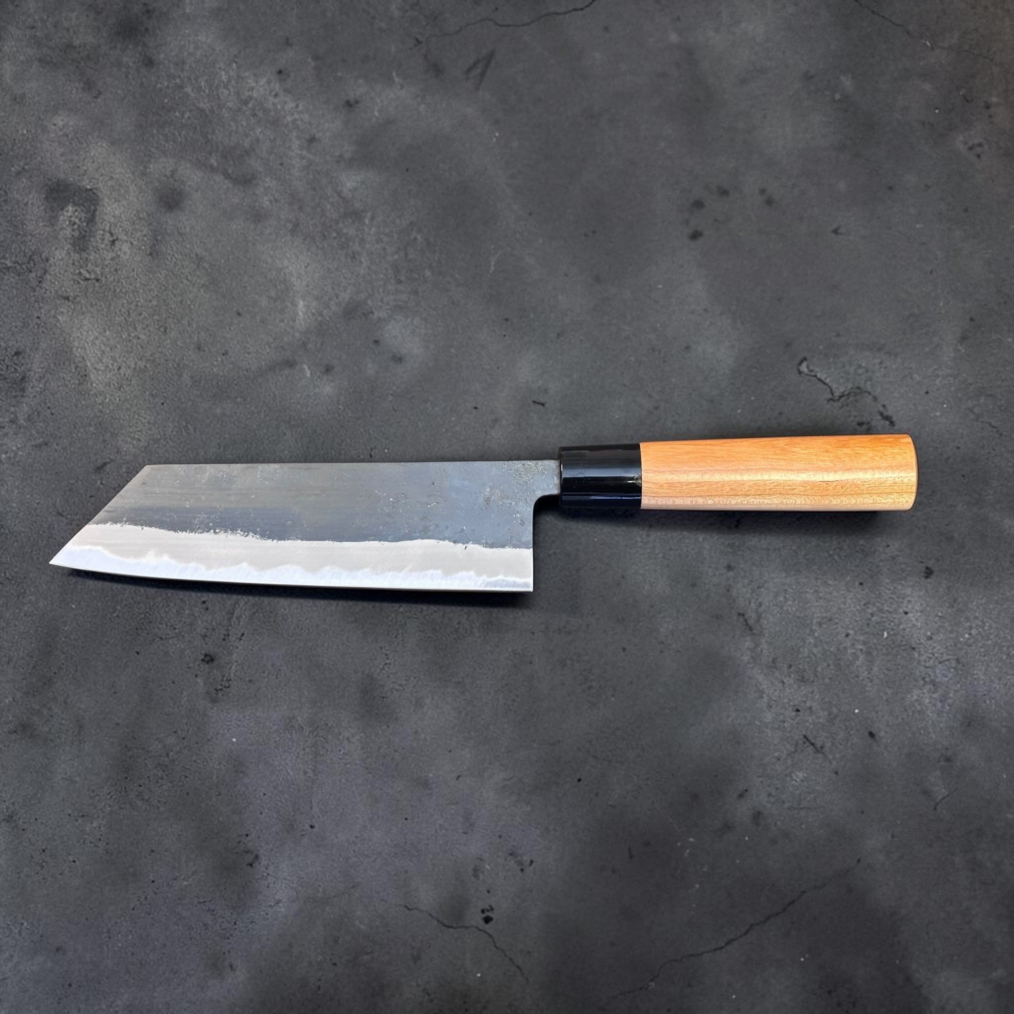 Hinokuni White #1 Kurouchi Bunka, full profile view with light wood handle and black ferrule.