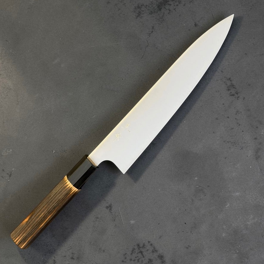 Kei Kobayashi SG2 Migaki Gyuto 210mm with burnt wood and black buffalo horn handle, kanji-side angled view