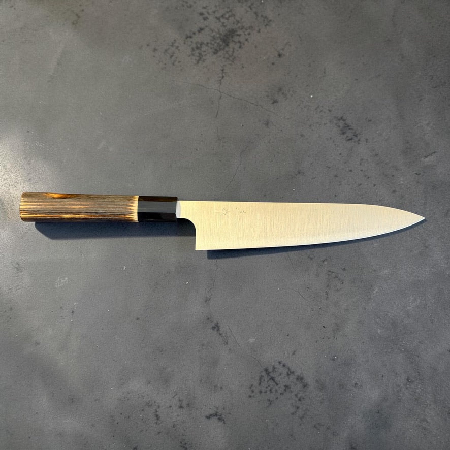 Full kanji-side profile of Kei Kobayashi SG2 Migaki Gyuto 210mm with burnt wood wa handle