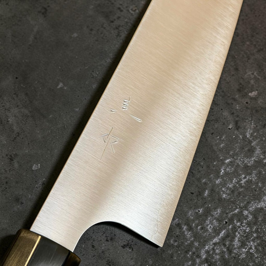Close-up of Kei Kobayashi SG2 Migaki Gyuto 210mm satin blade finish and engraved kanji