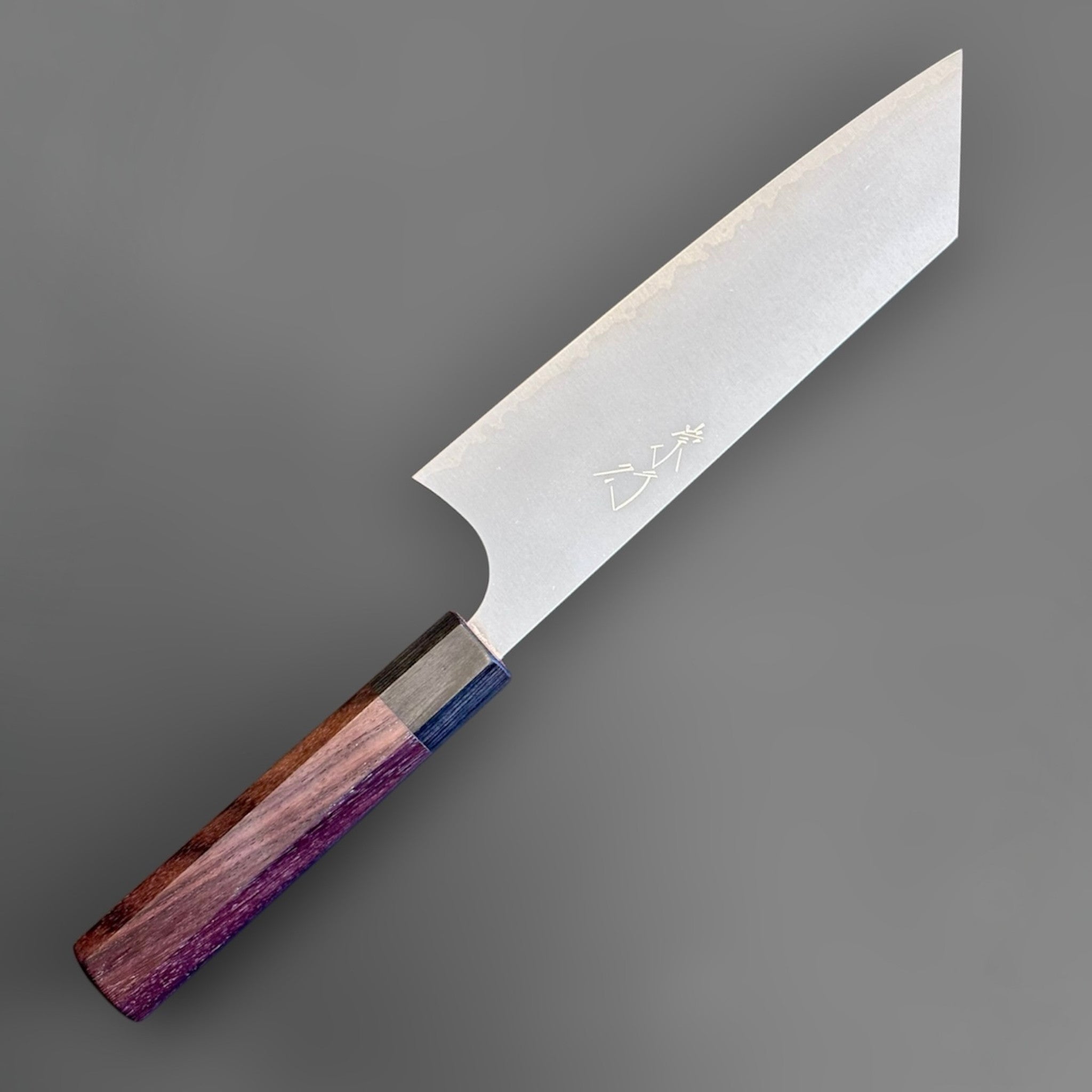 Koutetsu SG2 Bunka 180 mm with rosewood octagonal handle, front angle view showing the clean satin blade finish and engraved kanji.